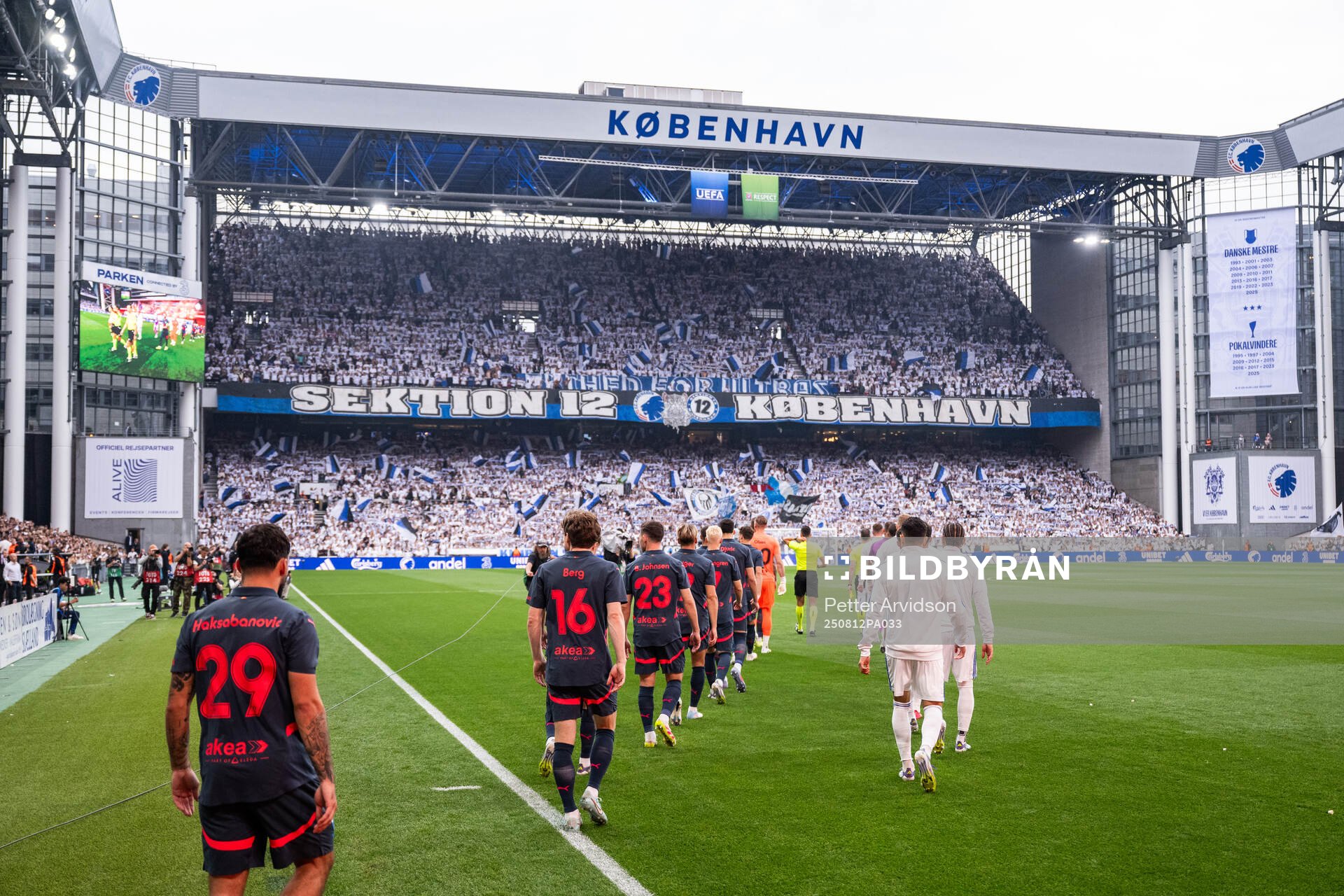 Players of Malmö FF and of FC Copenhagen enter the pitch