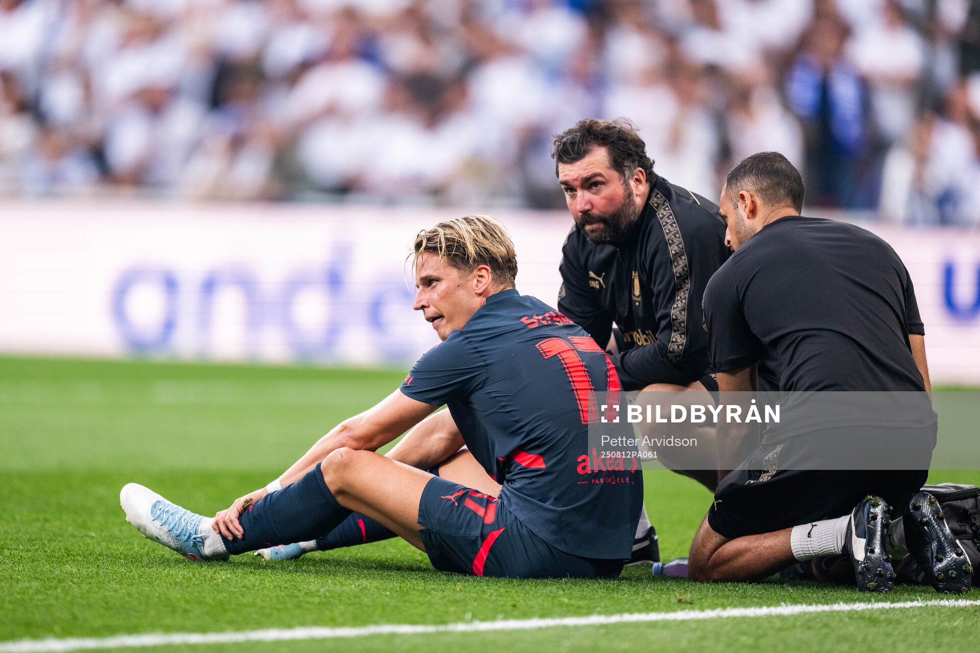 Jens Stryger Larsen of Malmö FF receives medical attention