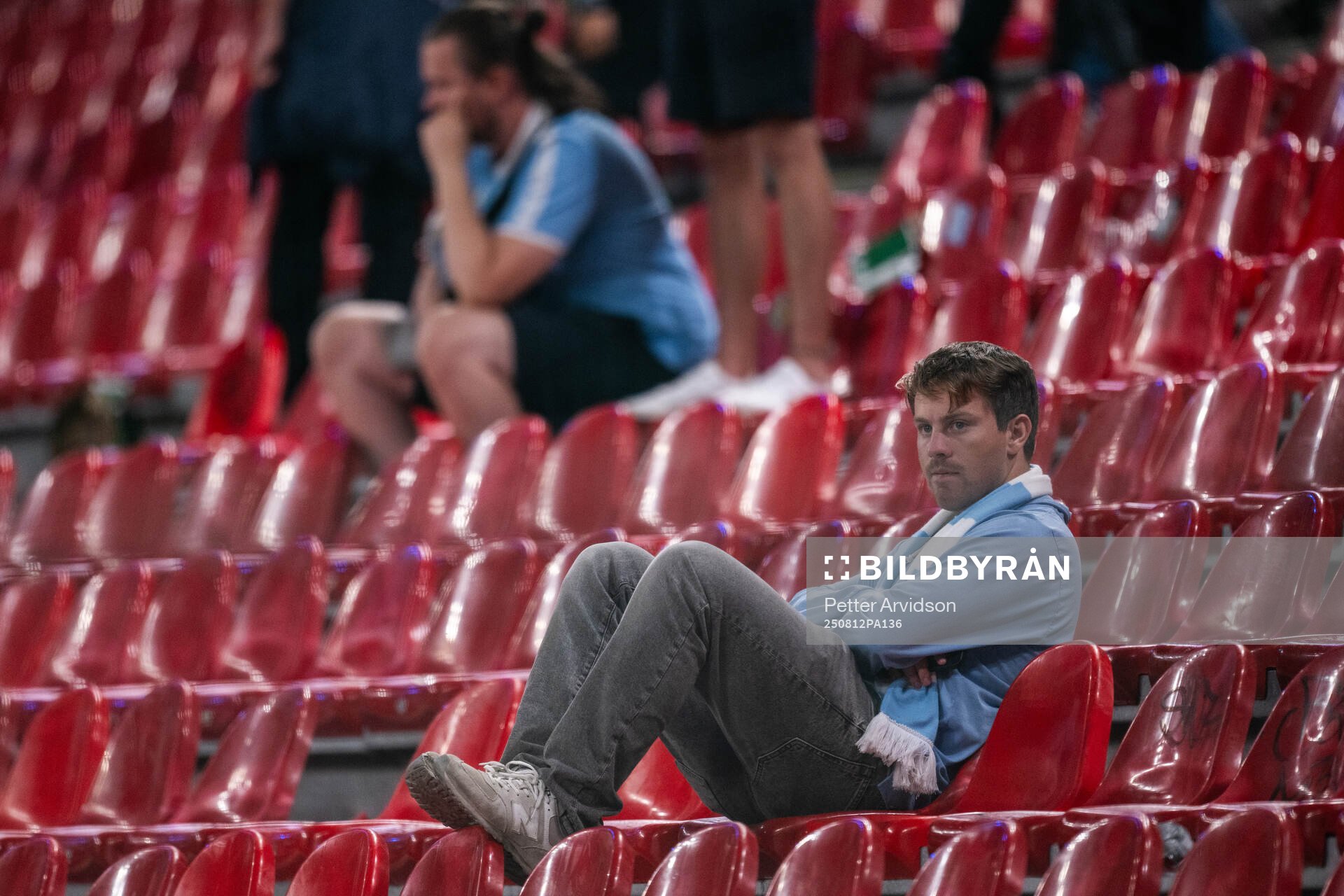 A fan of Malmö FF looks dejected