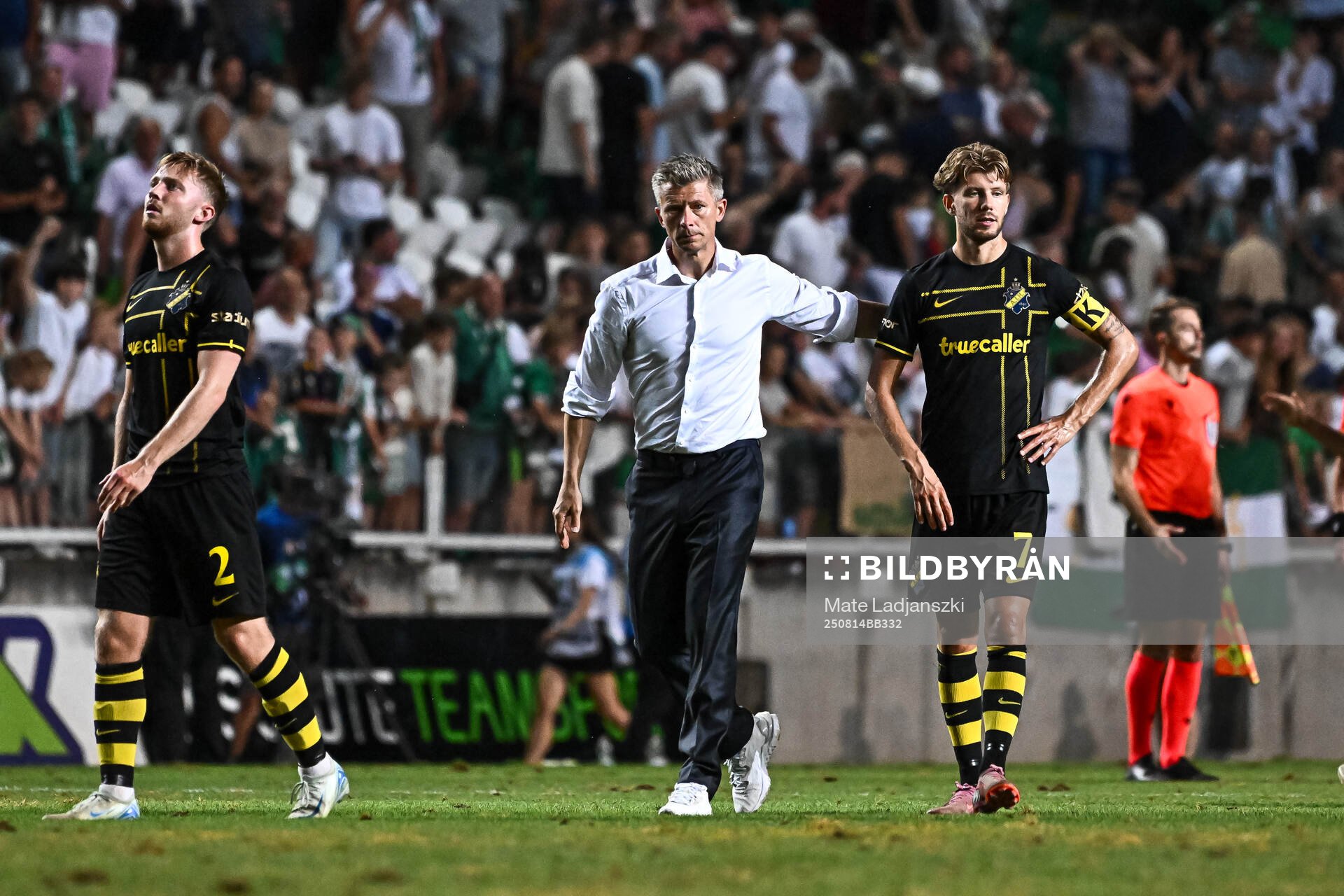 Coach Mikkjal Thomassen and Anton Salétros of AIK look