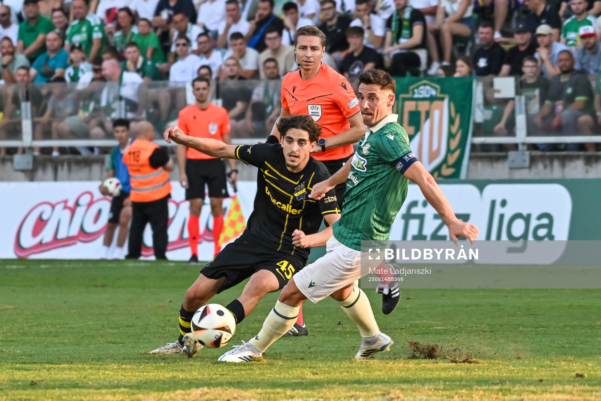 Taha Ayari of AIK and  Referee Lawrence Visser
