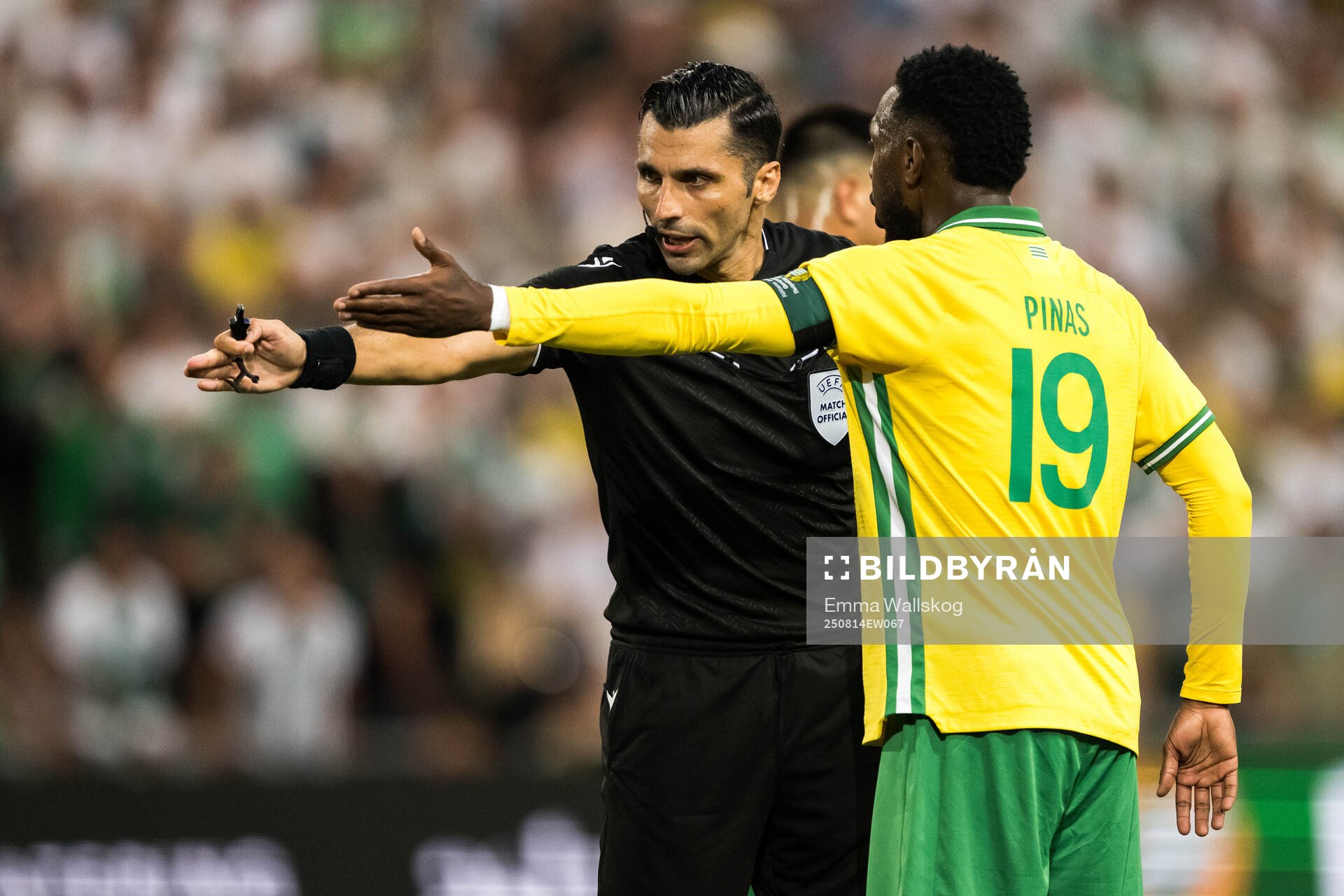 Referee Vassilis Fotias and Shaquille Pinas of Hammarby