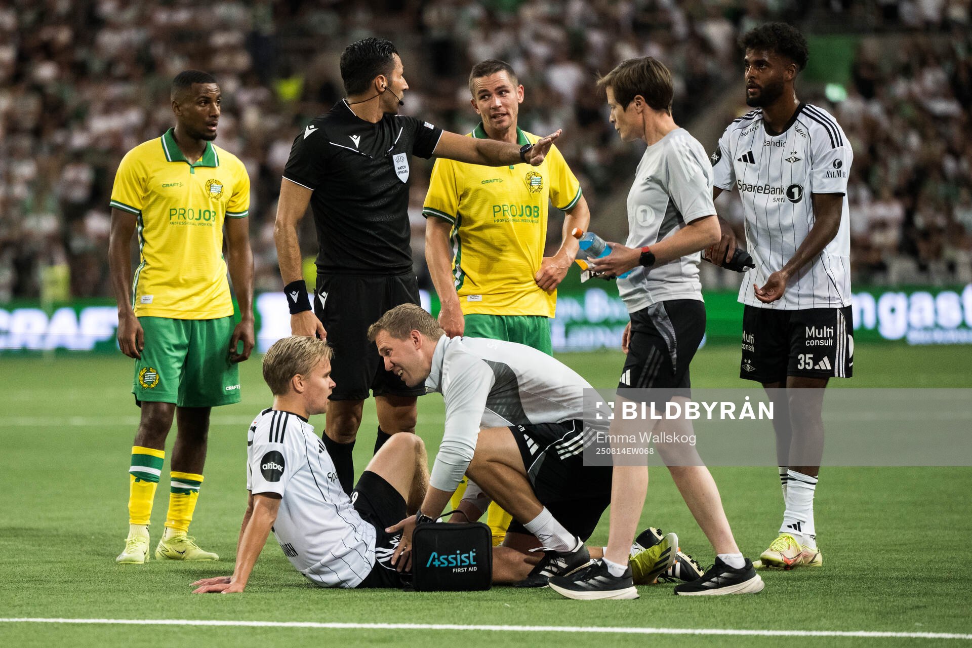 Santeri Väänänen of Rosenborg receives medical attention
