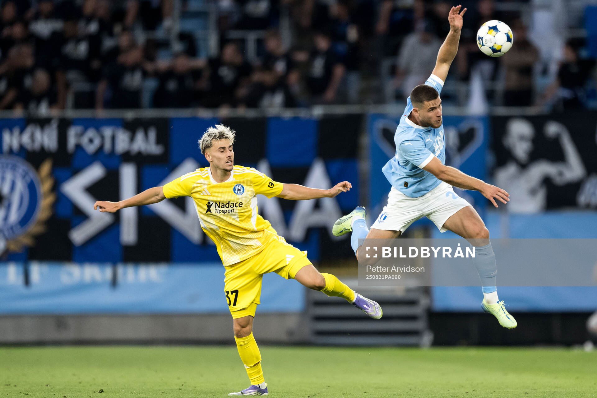 Stepan Langer of SK Sigma Olomouc and Gabriel Busanello of