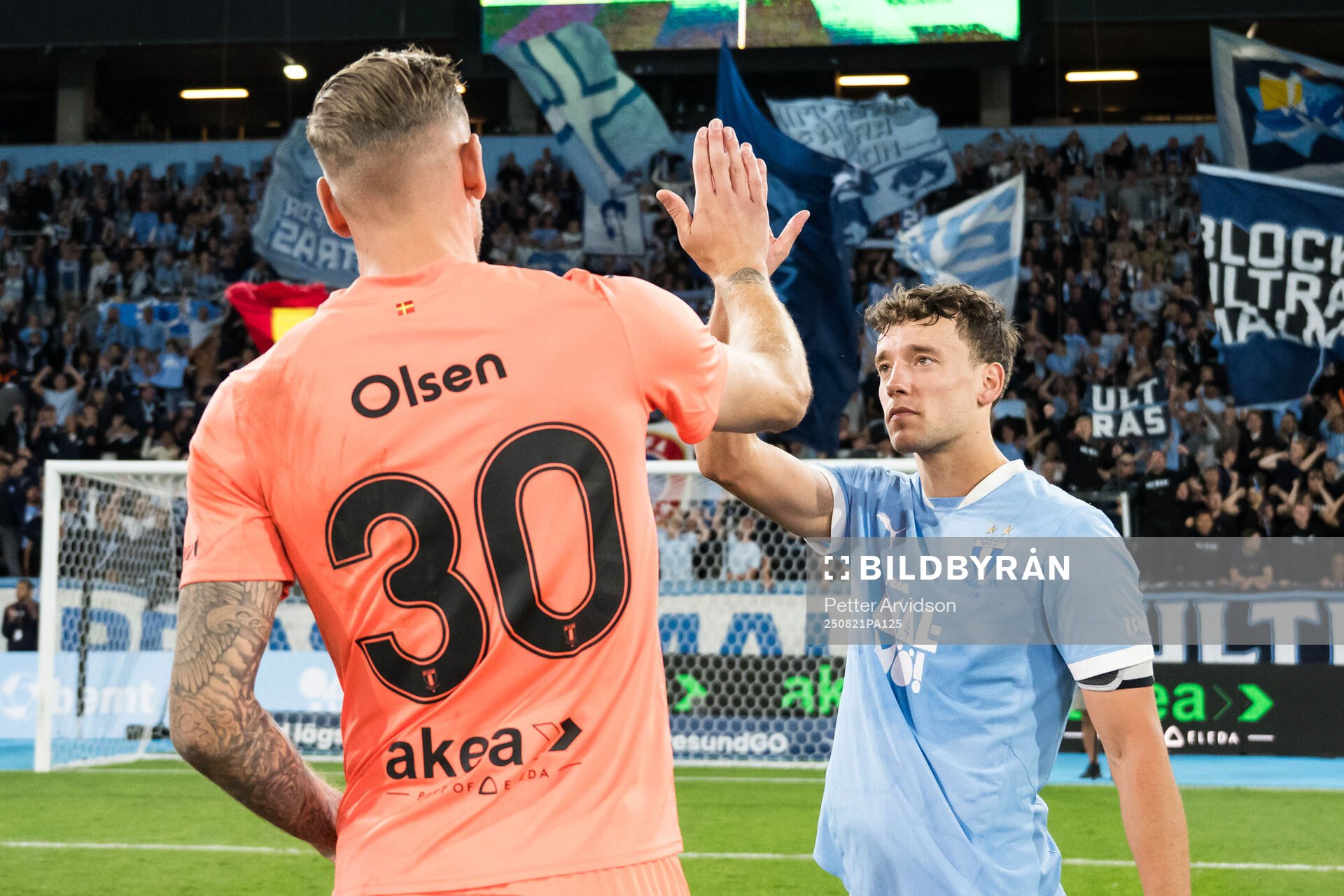 Robin Olsen and Colin Rösler of Malmö FF celebrate