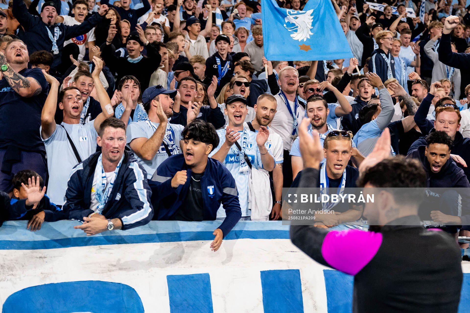 Fans and Sead Haksabanovic of Malmö FF celebrate
