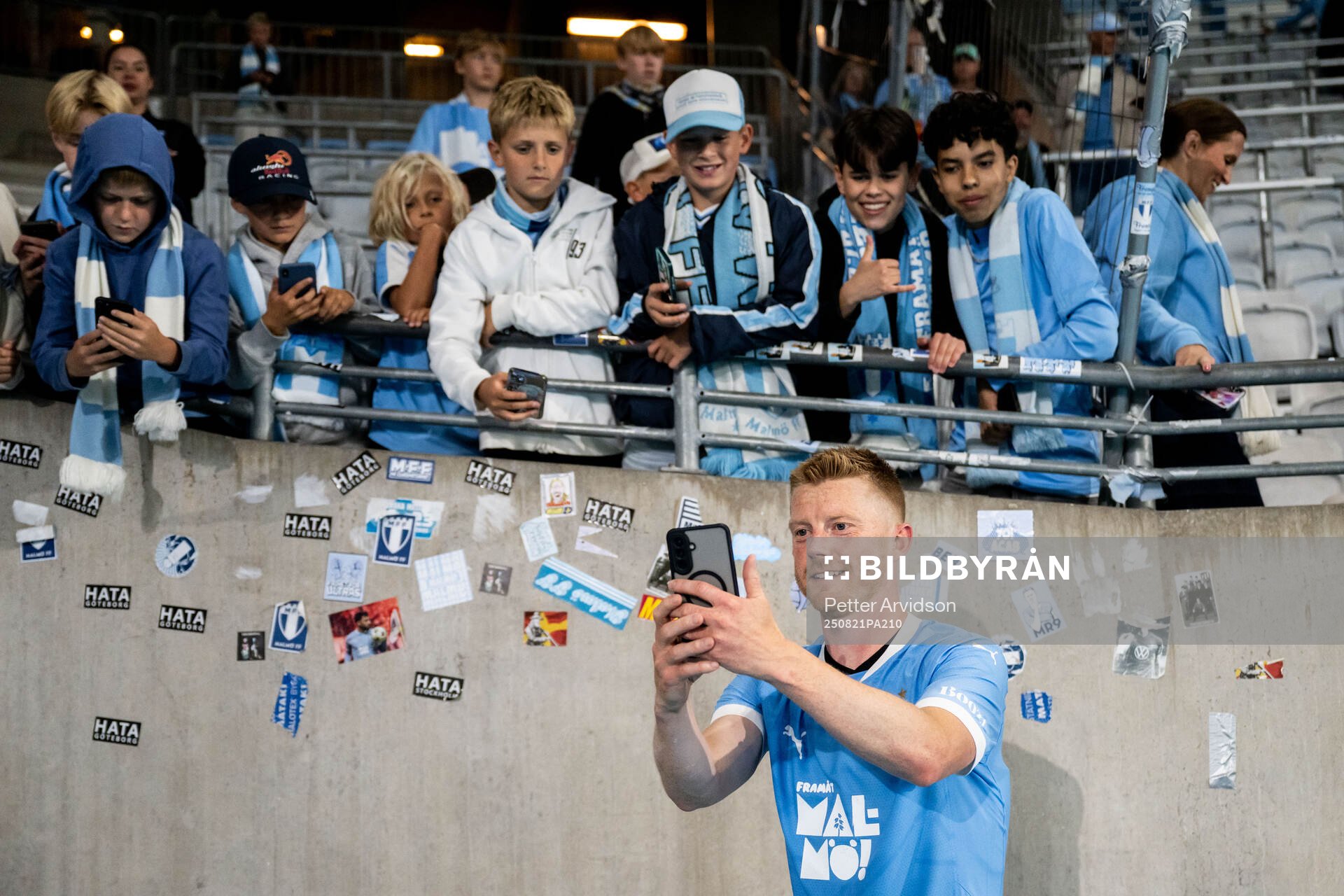 Anders Christiansen of Malmö FF takes selfies with fans