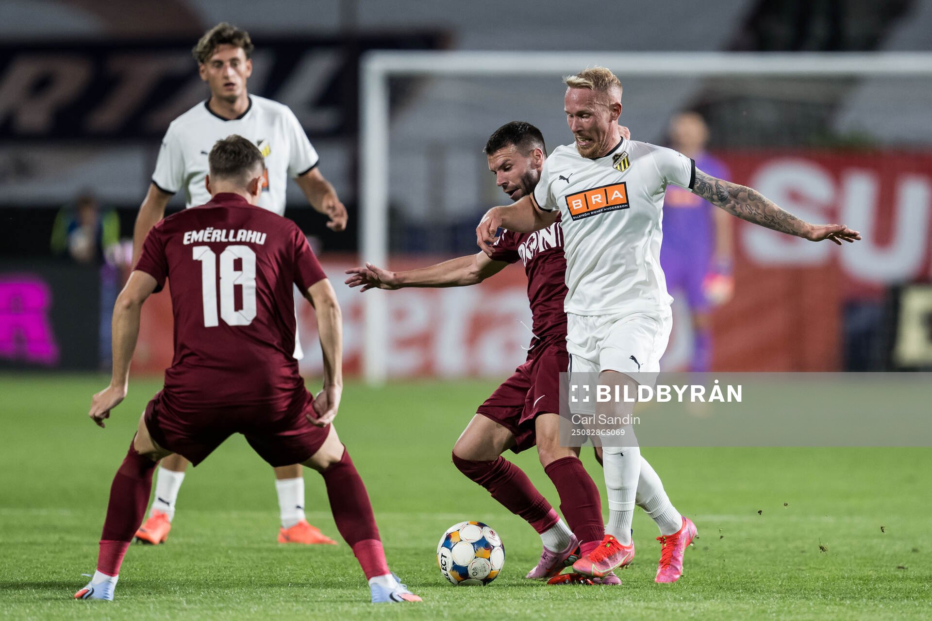 Andrei Cordea of CFR Cluj and Mikkel Rygaard Jensen of