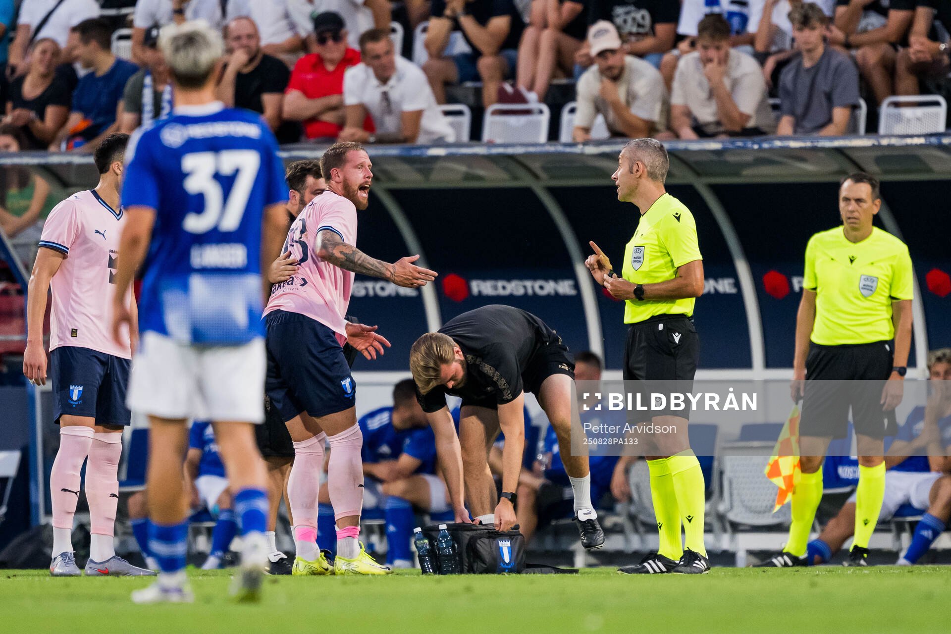 Pontus Jansson of Malmö FF and Referee Radu Petrescu