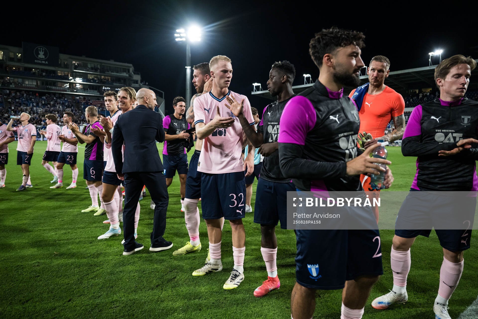 Daniel Gudjohnsen and Salifou Soumah of Malmö FF
