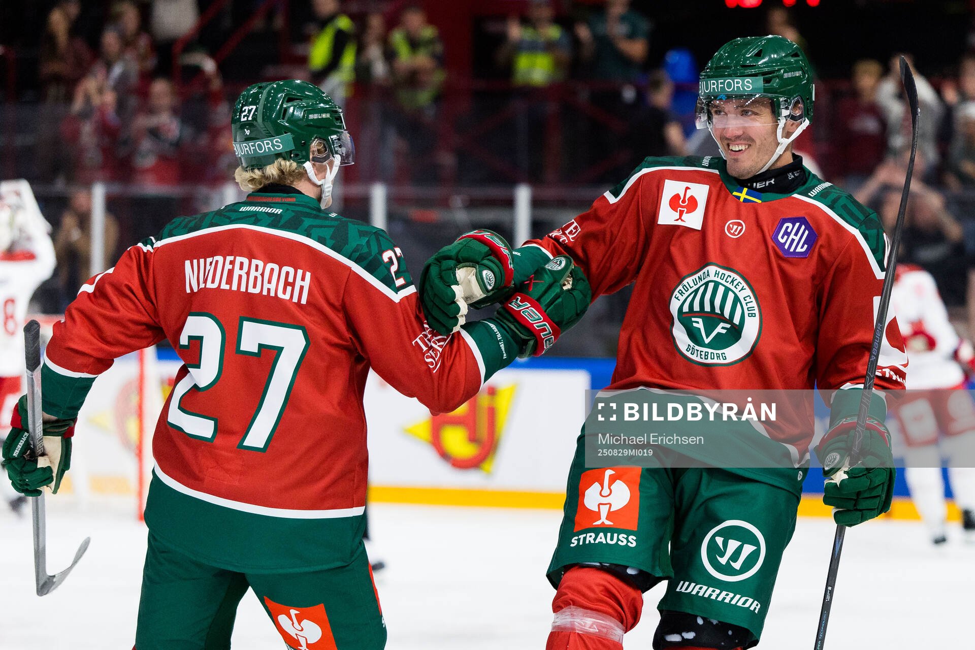 Max Lindholm of Frölunda celebrates with Theodor Niederbach