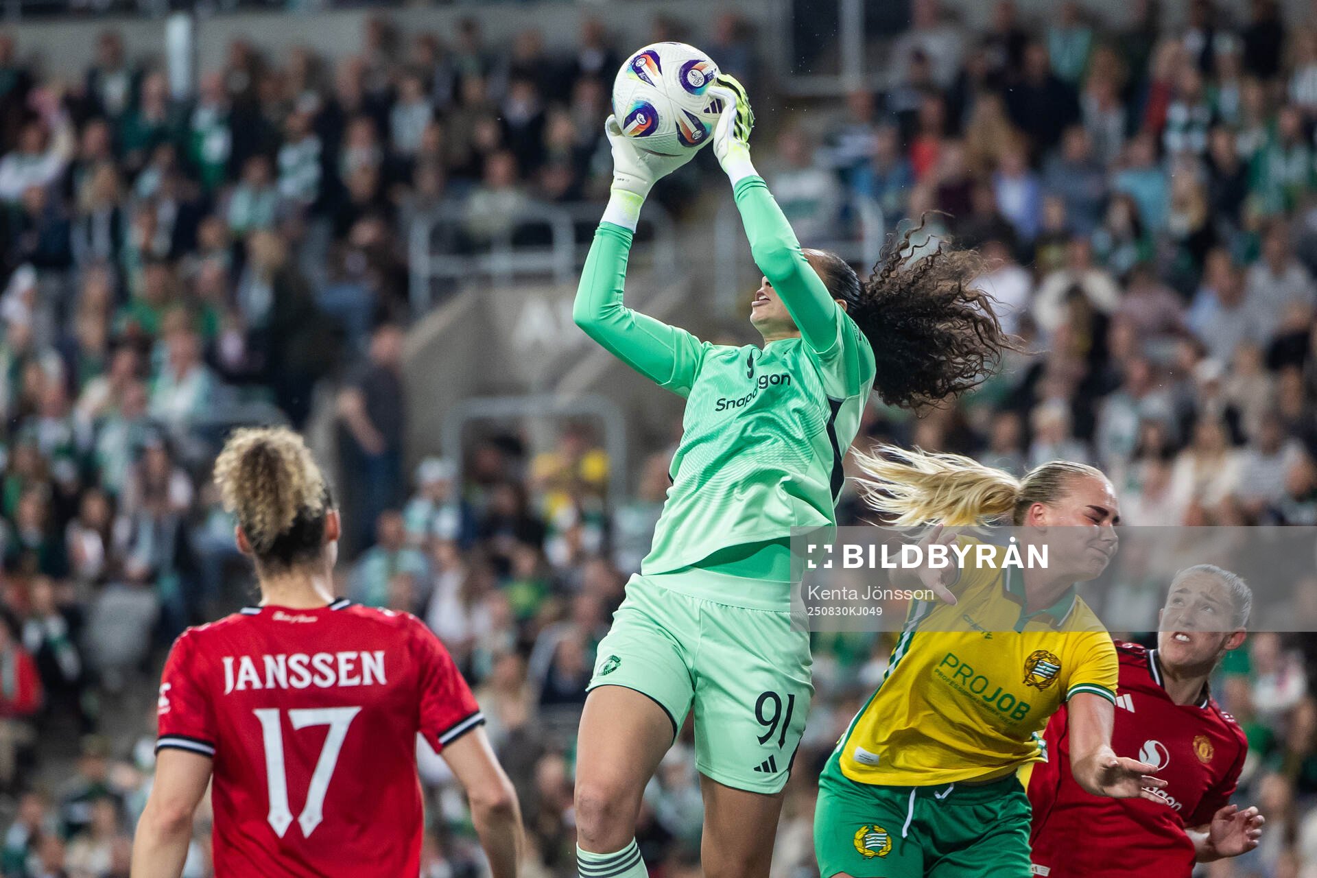 Goalkeeper Phallon Tullis-Joyce of Manchester United and