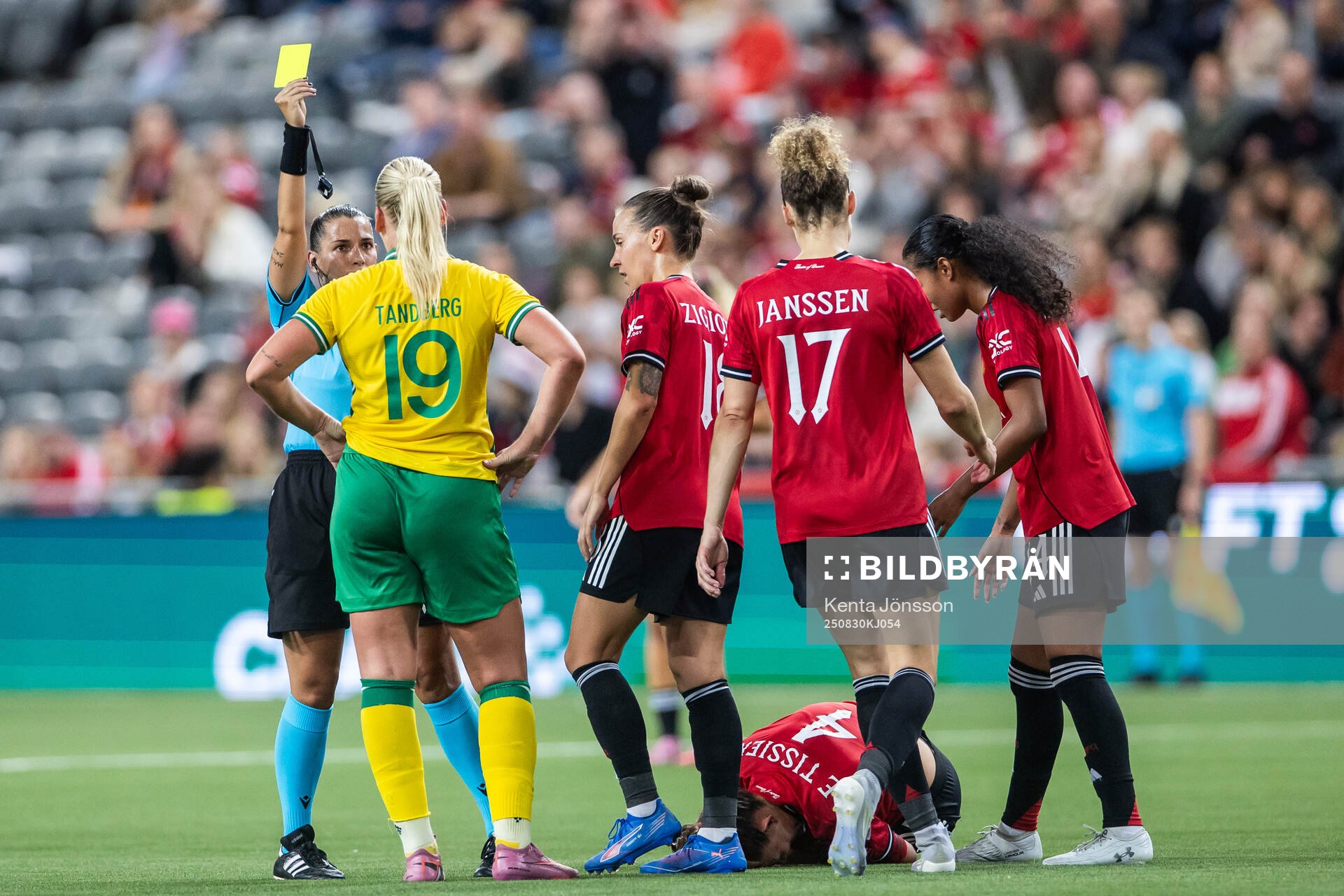 Referee  Michaela Pachtova gives a yellow card to Cathinka