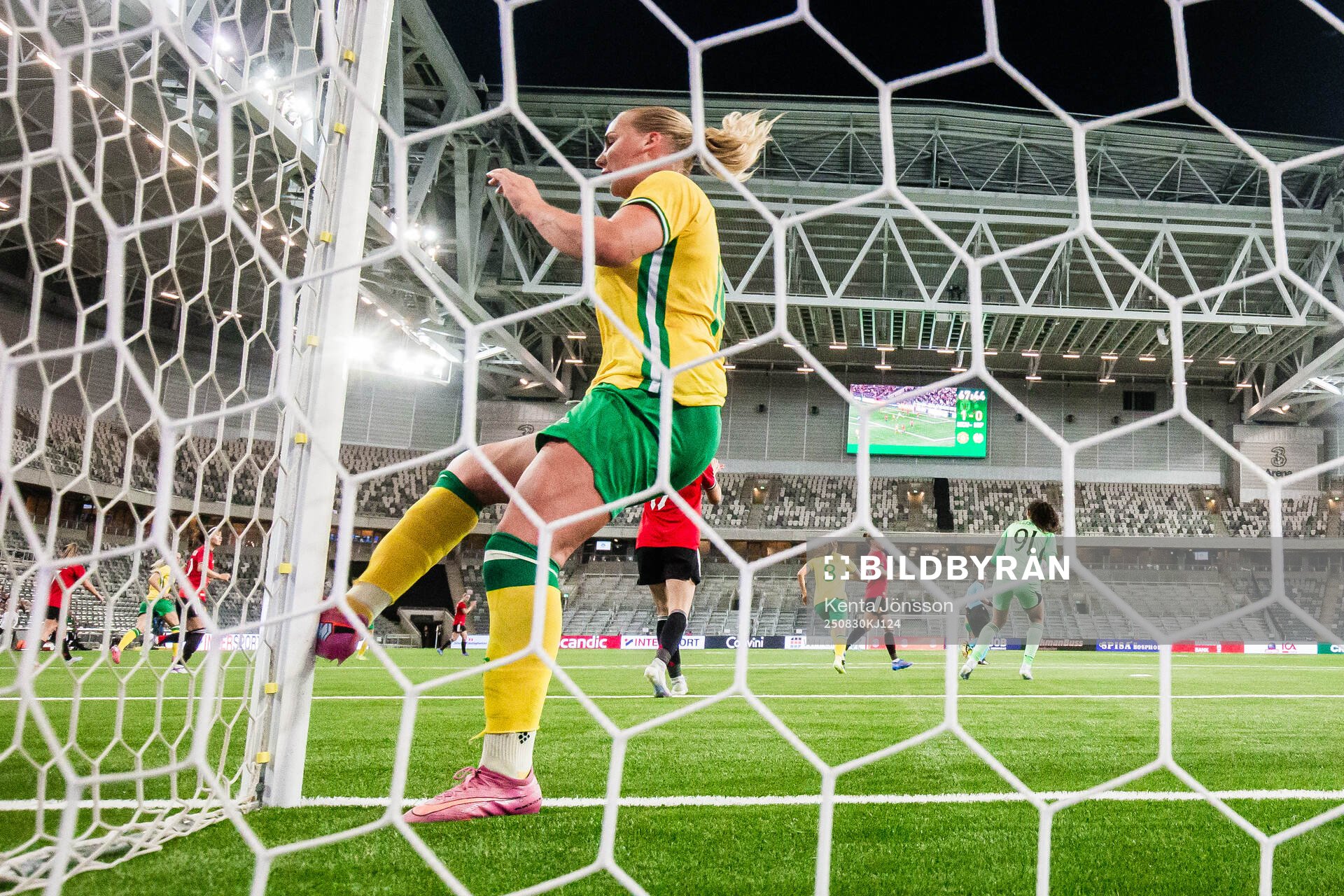 Cathinka Tandberg of Hammarby kicks the goal post
