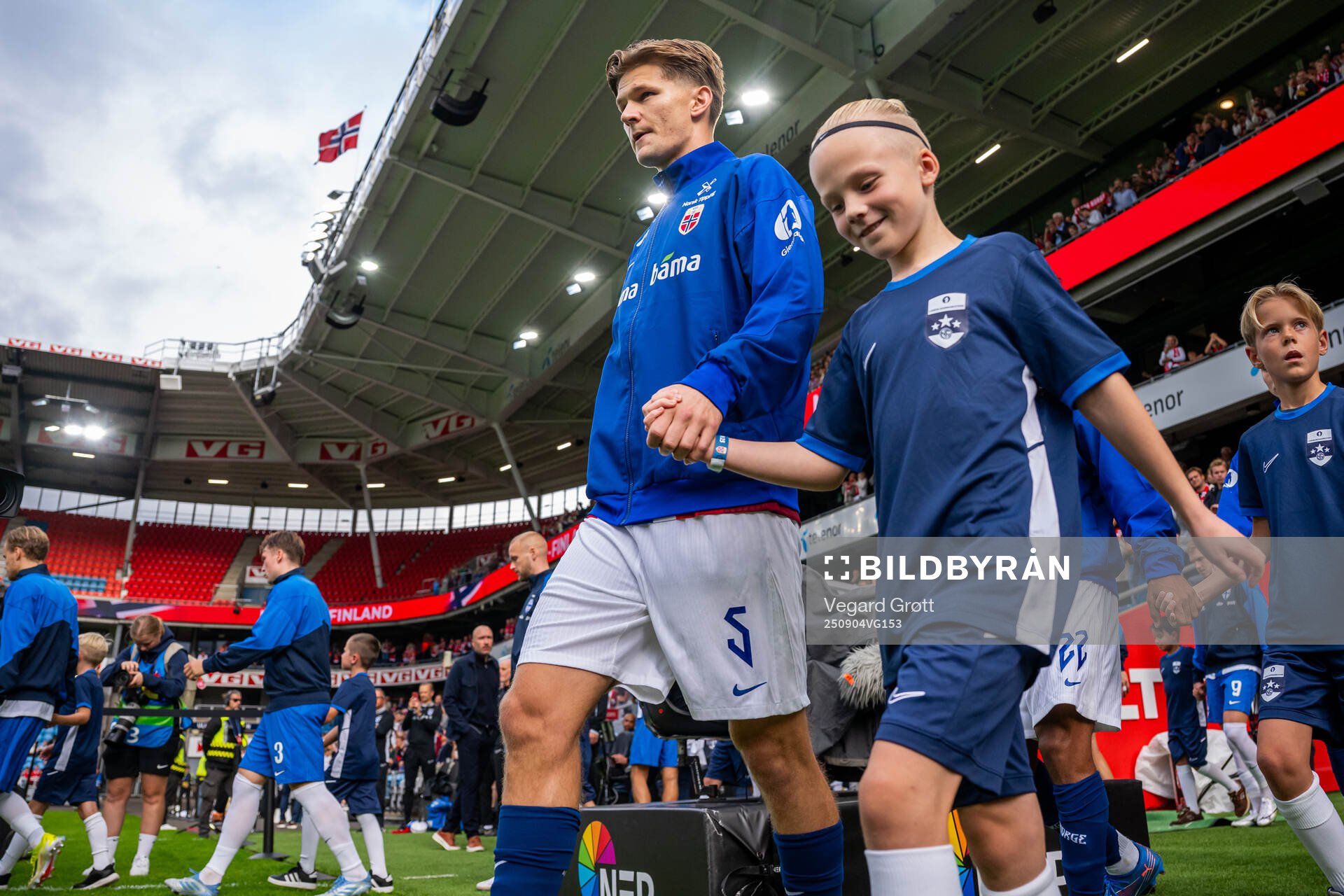 David Møller Wolfe of Norway enters the pitch
