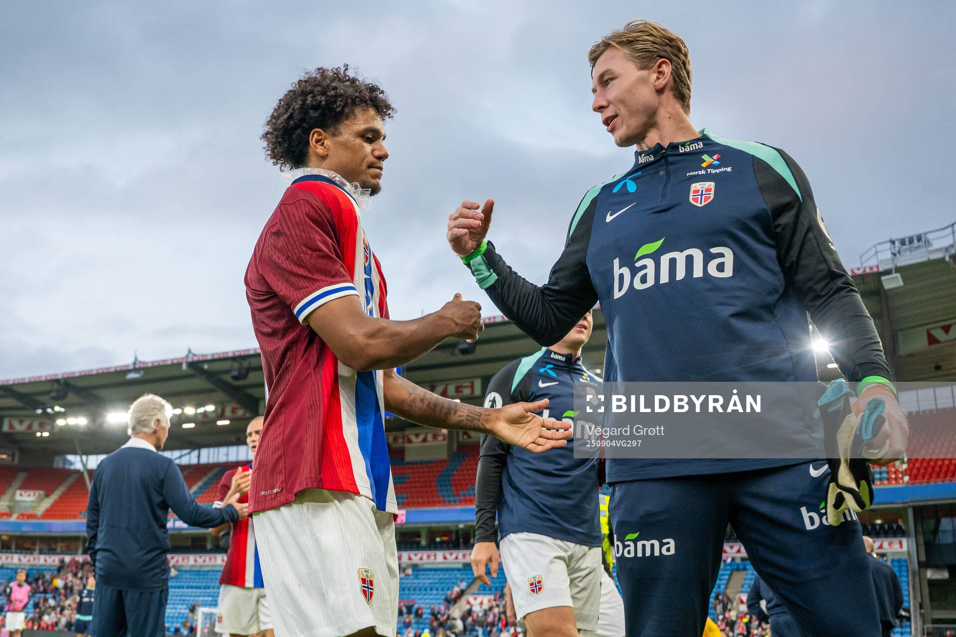 Oscar Bobb and goalkeeper Mathias Dyngeland of Norway