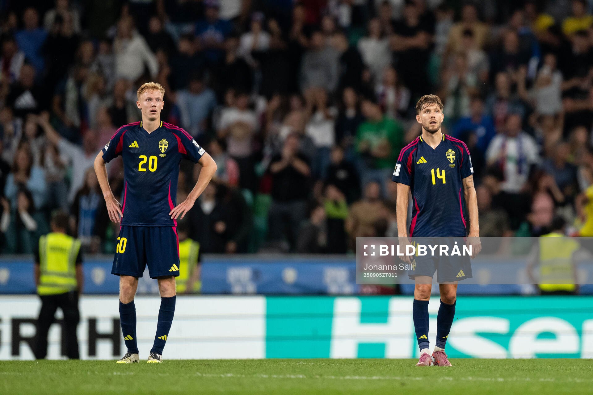 Hugo Larsson and Anton Salétros of Sweden look dejected