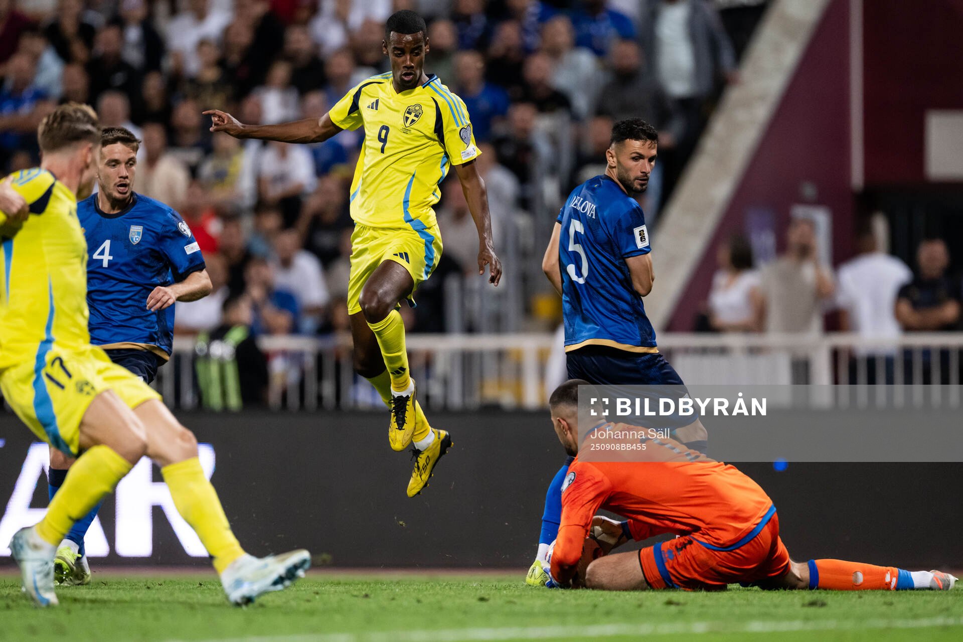 Alexander Isak of Sweden and goalkeeper Arijanet Muric of