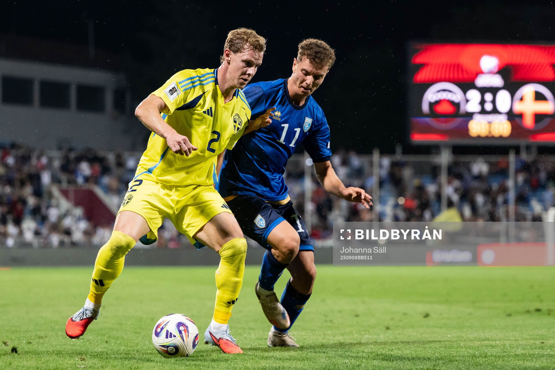 Emil Krafth of Sweden and Fisnik Asllani of Kosovo