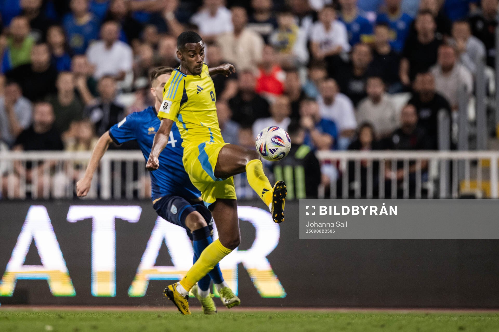 Ilir Krasniqi of Kosovo and Alexander Isak of Sweden