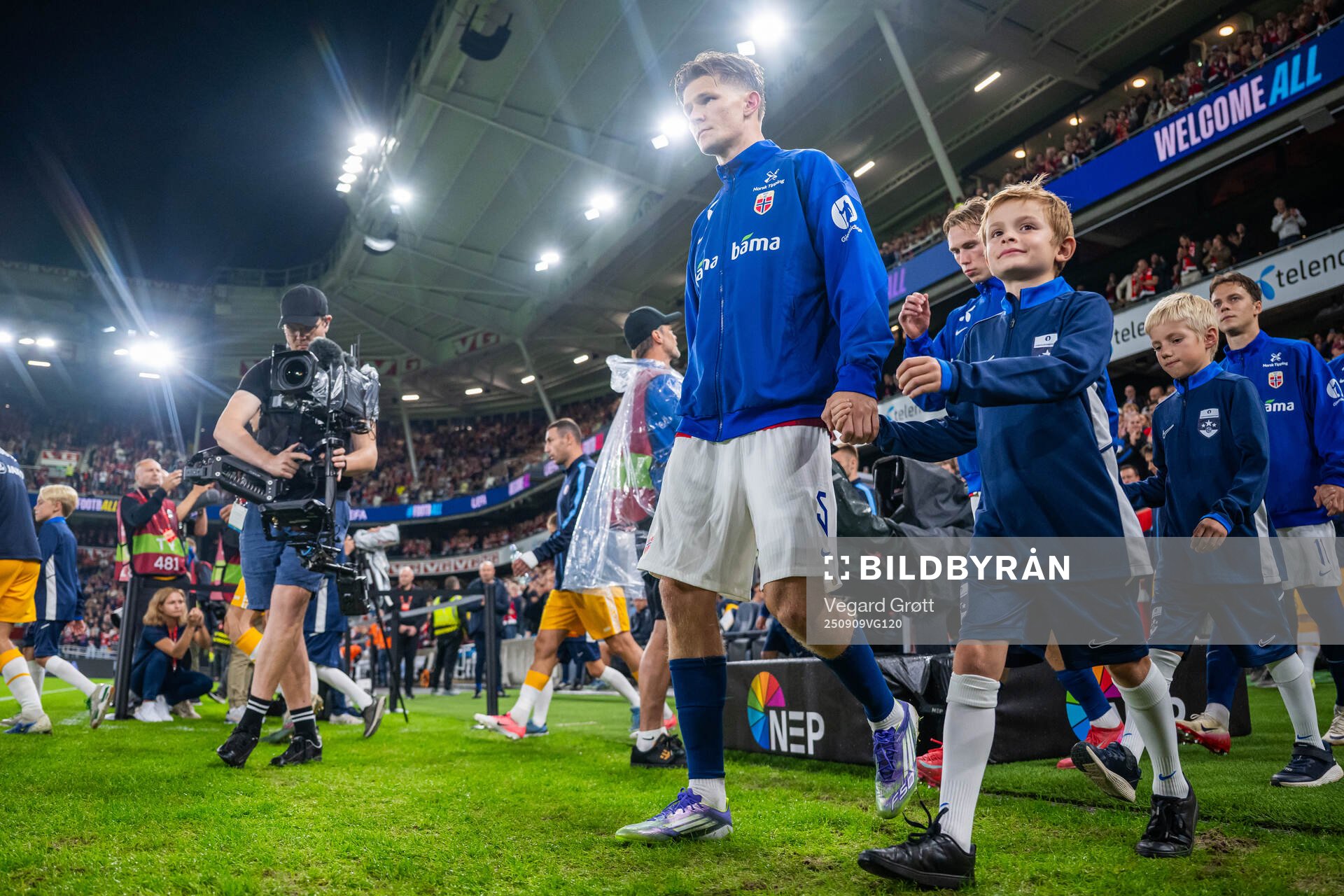 David Møller Wolfe of Norway enters the pitch