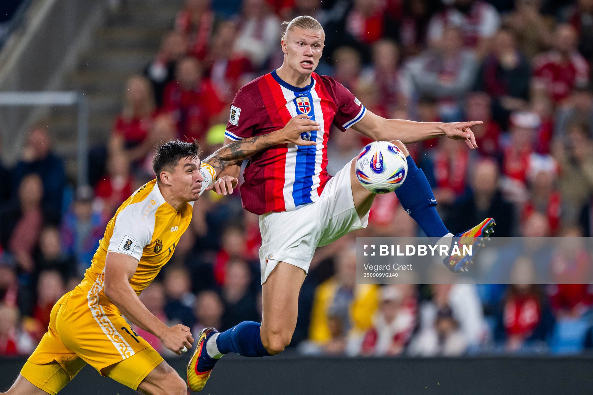 Artur Craciun of Moldova and Erling Braut Haaland of Norway
