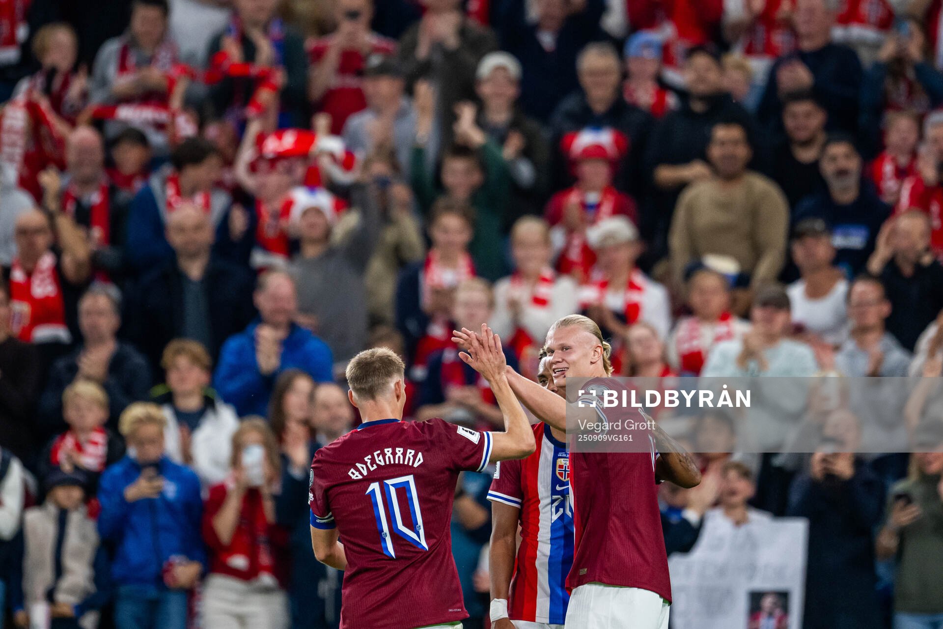 Erling Braut Haaland of Norway celebrates with teammate