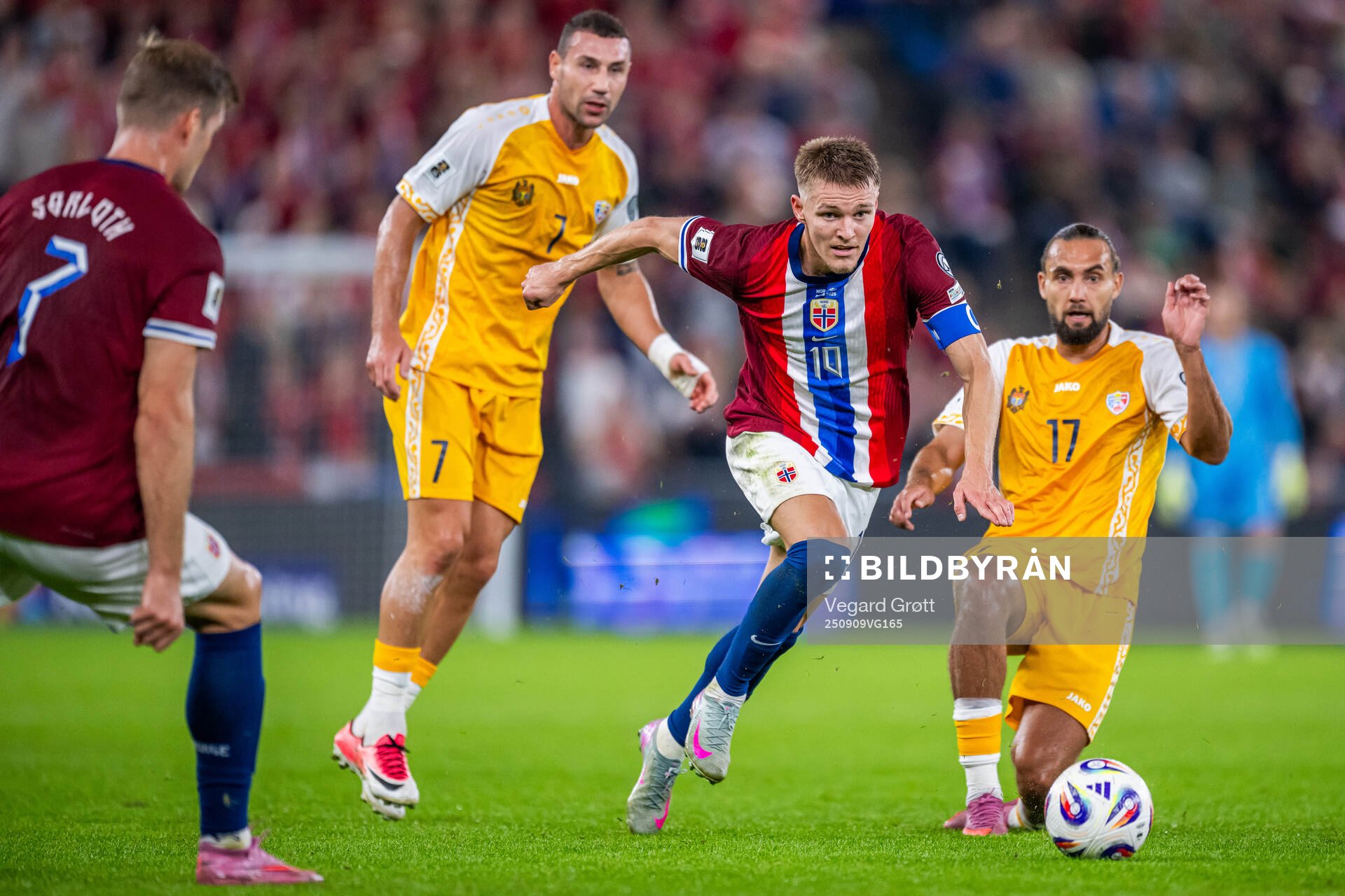 Martin Ødegaard of Norway and Virgiliu Postolachi of
