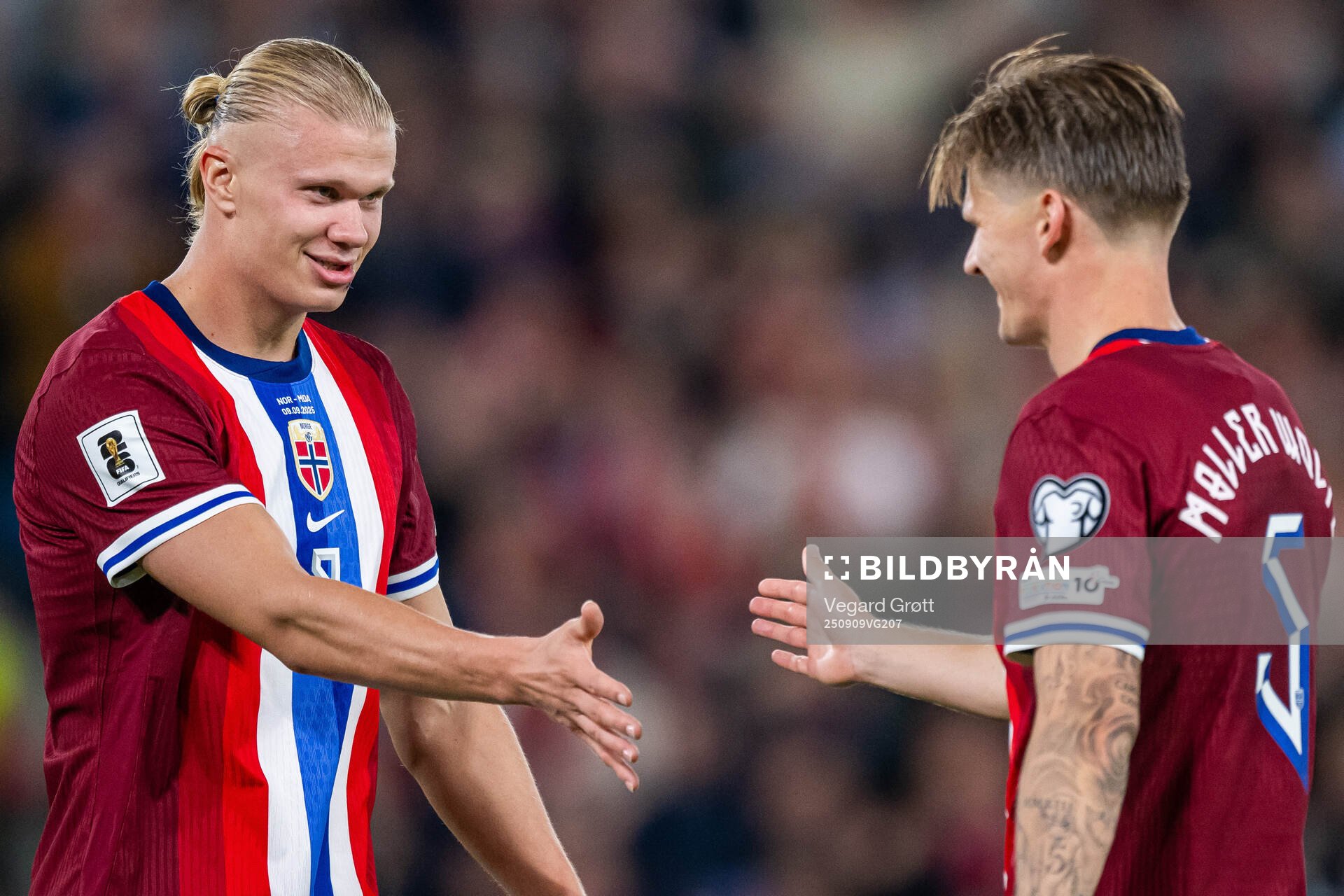 Erling Braut Haaland of Norway celebrates with teammate