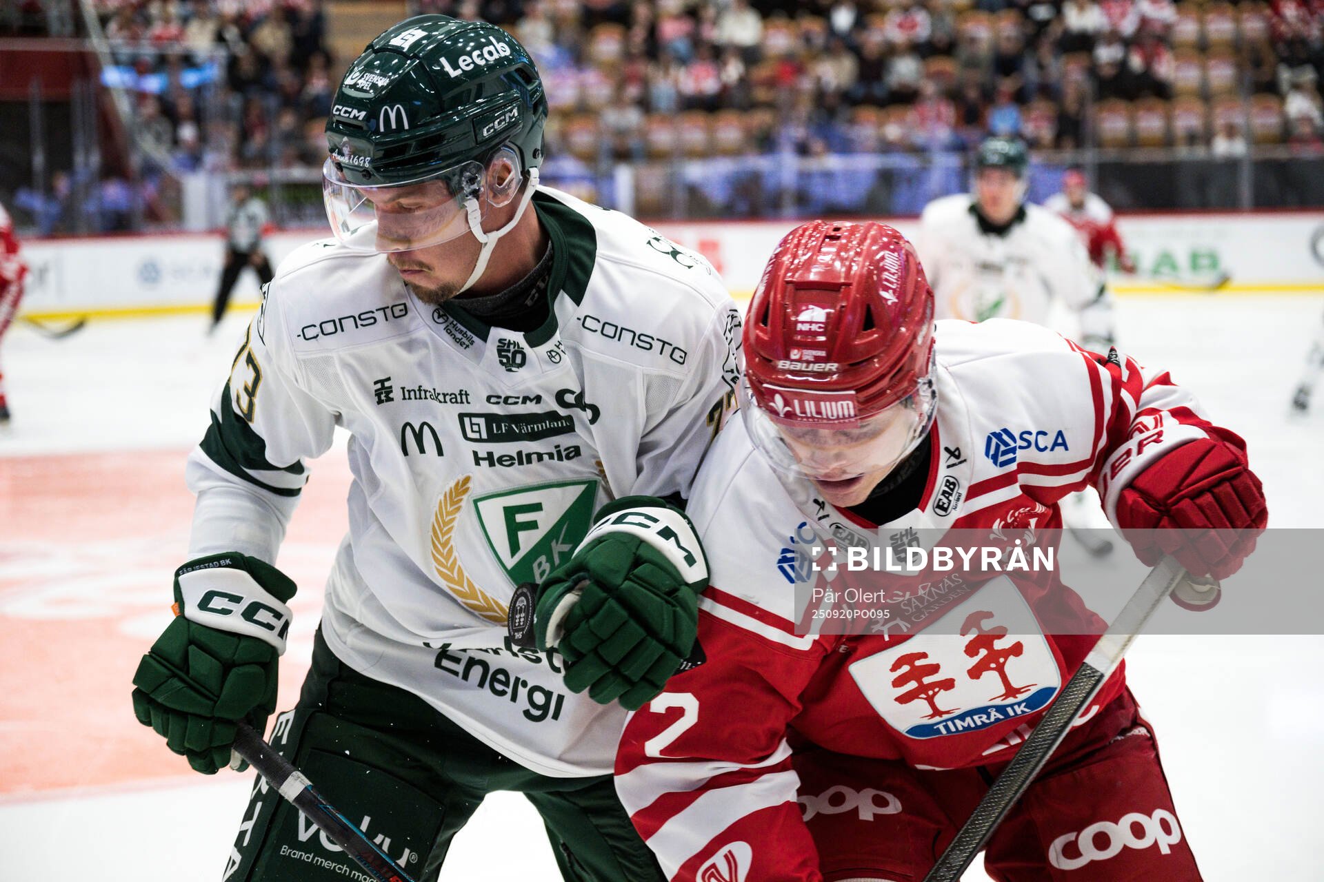 Färjestads Adam Ollas Mattsson och Timrås Erik Walli