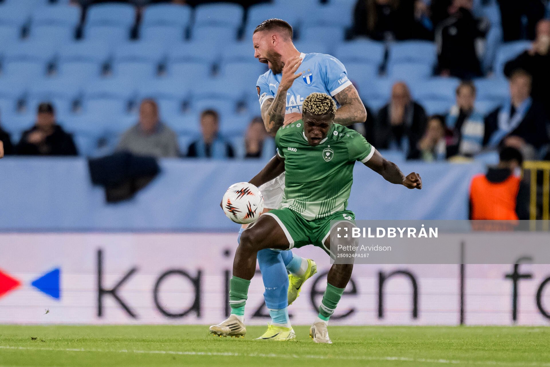 Pontus Jansson of Malmö FF and Yves Erick Bile of