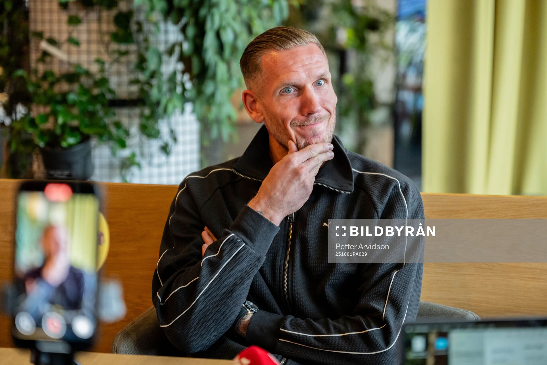 Goalkeeper Robin Olsen of Malmö FF is being interviewed at