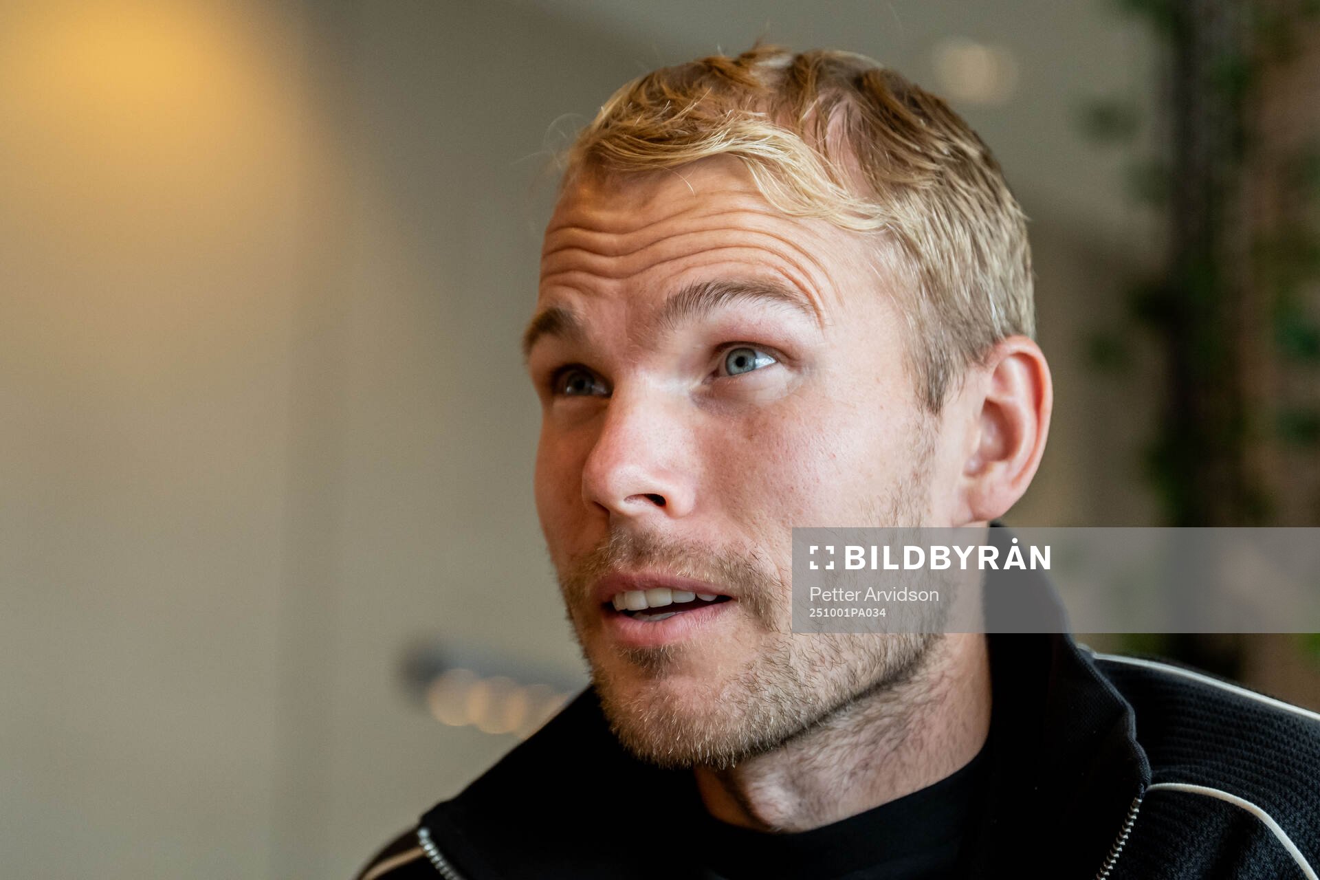 Oscar Lewicki of Malmö FF is being interviewed at a press