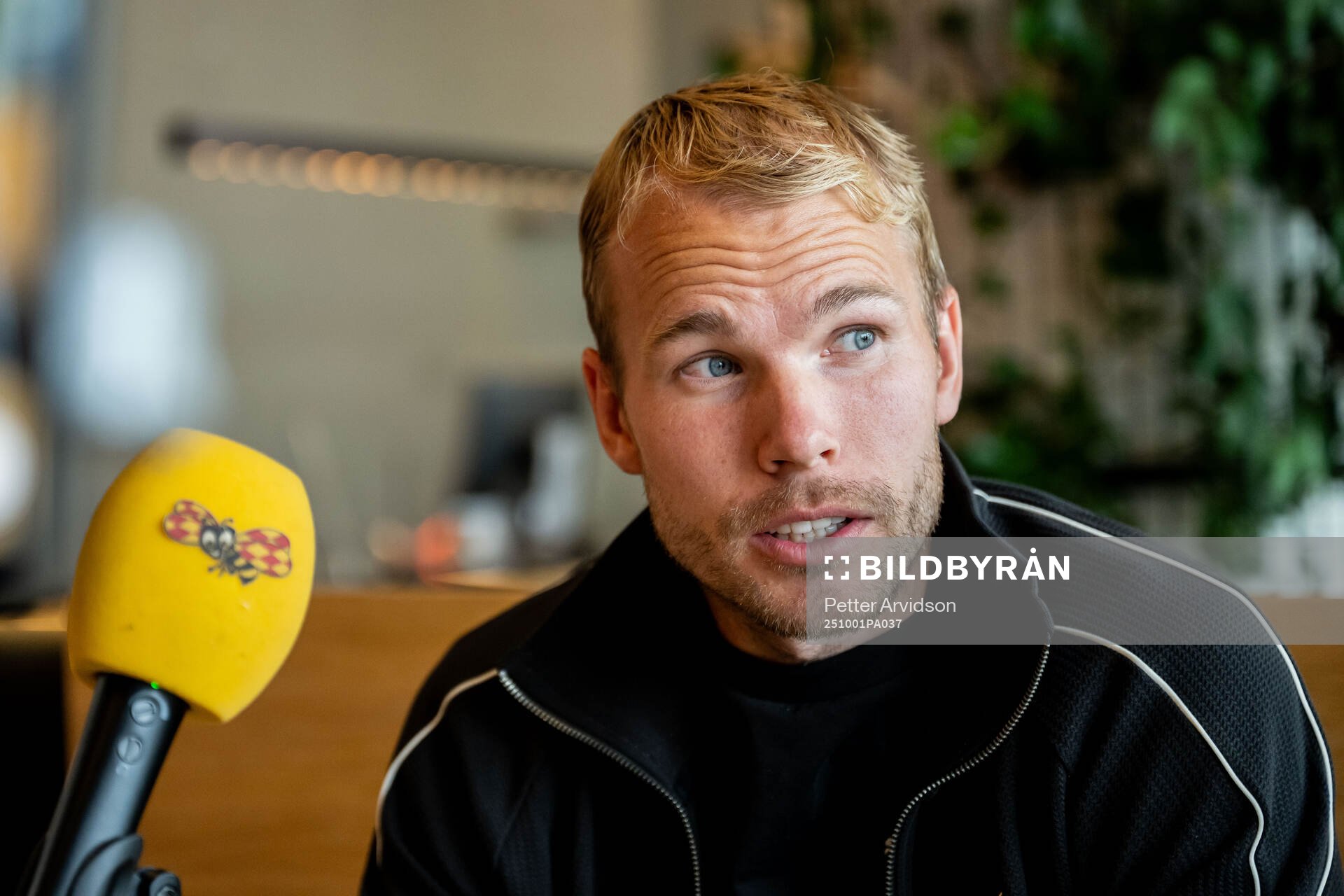 Oscar Lewicki of Malmö FF is being interviewed at a press