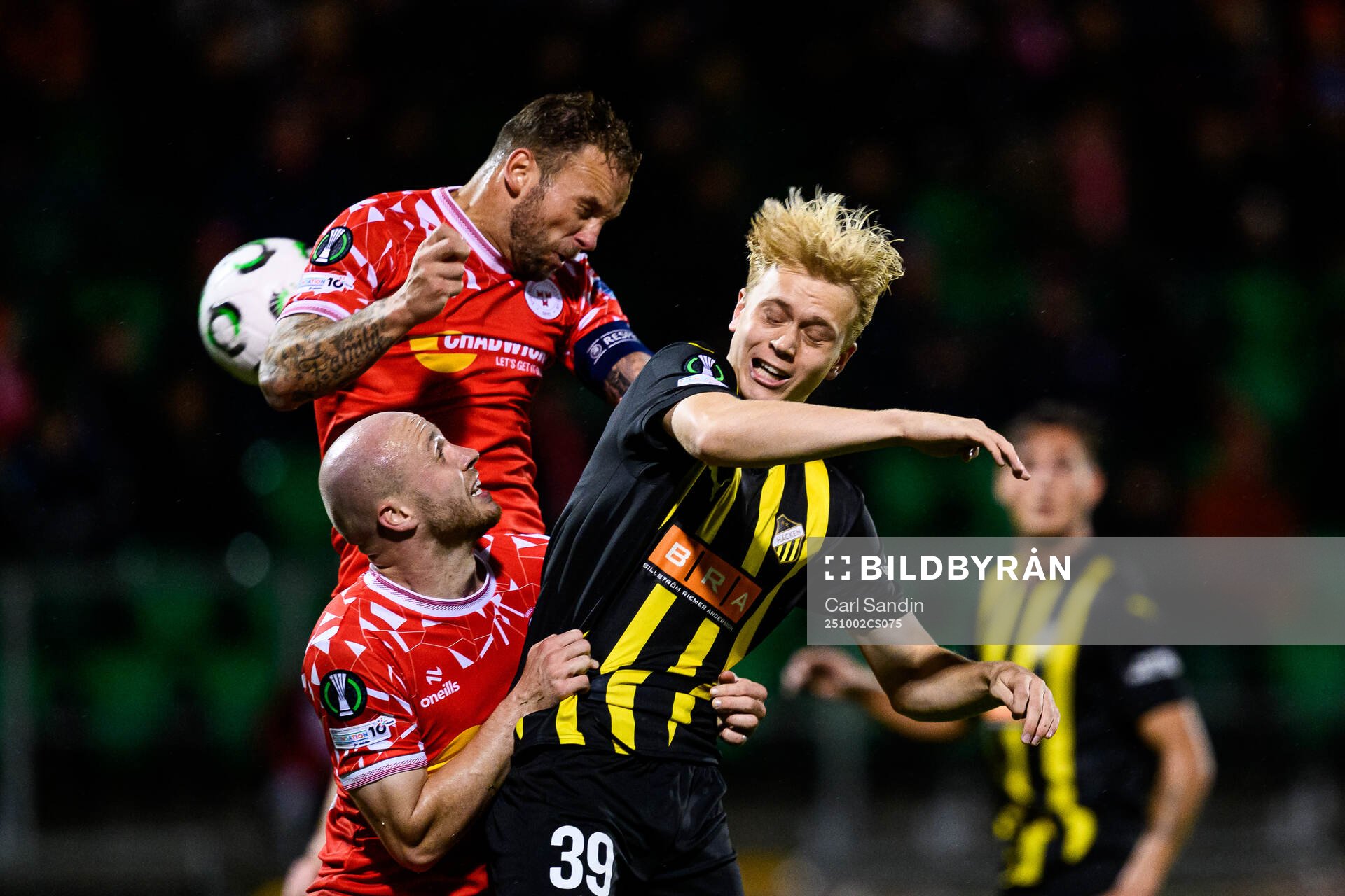 Patrick Barrett of Shelbourne FC and Isak Brusberg of