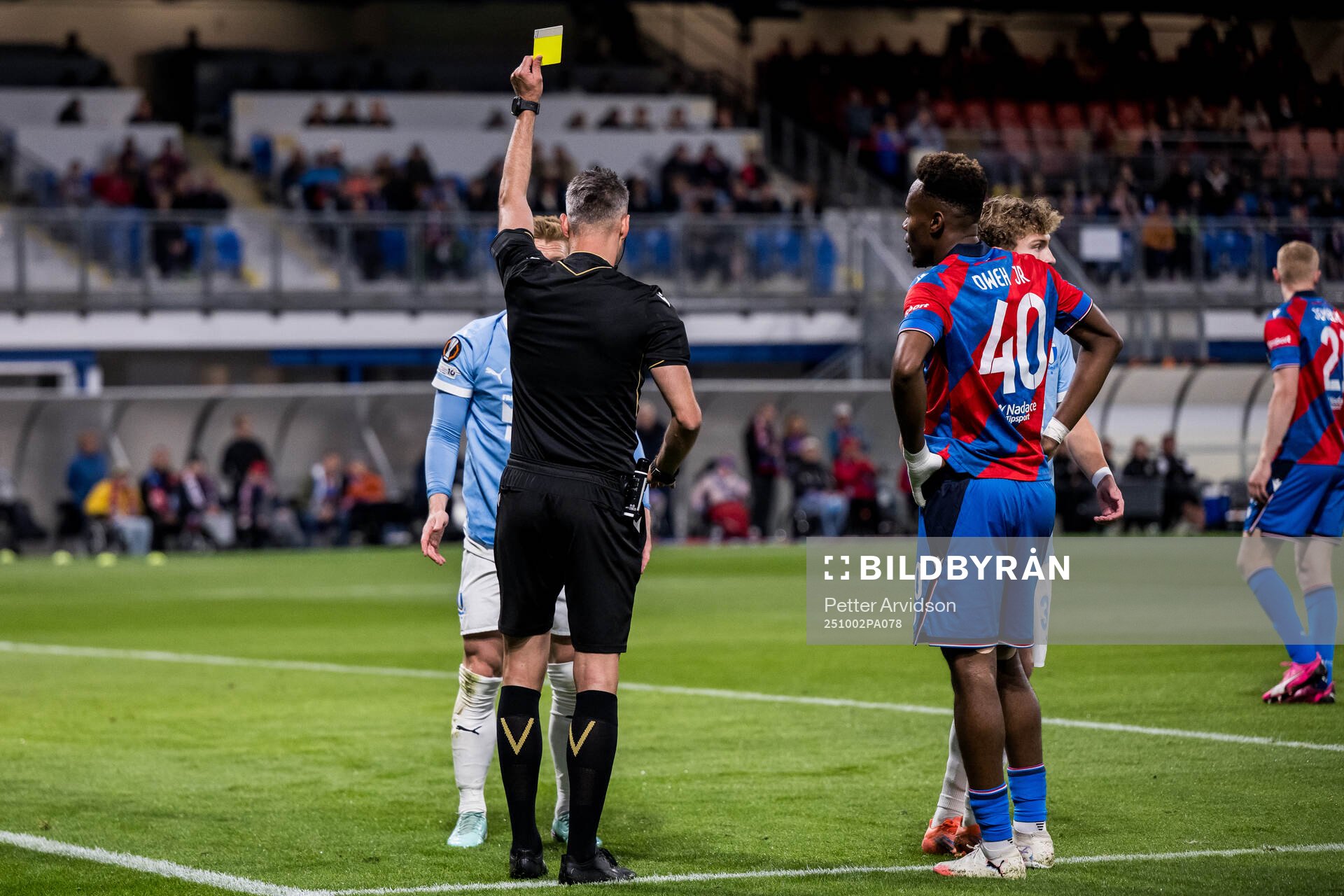 Anders Christiansen of Malmö FF receives a yellow card
