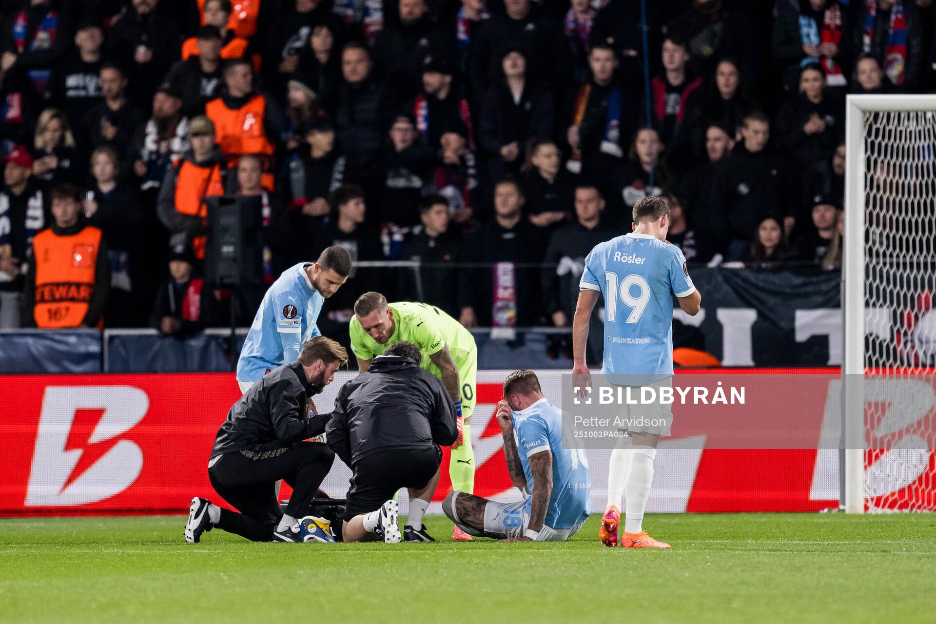 Pontus Jansson of Malmö FF receives medical attention