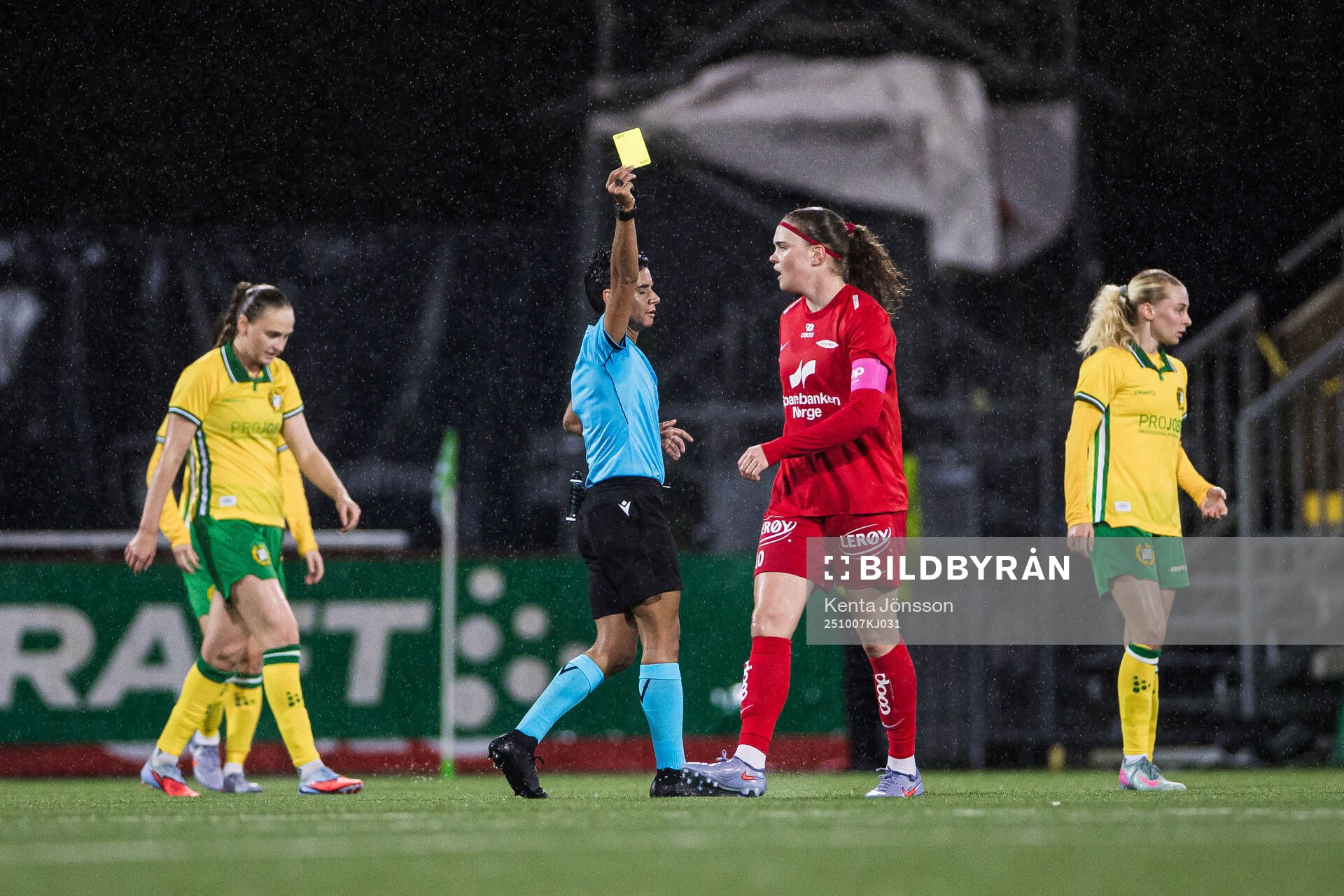 Signe Gaupset of Brann receives a yellow card from referee