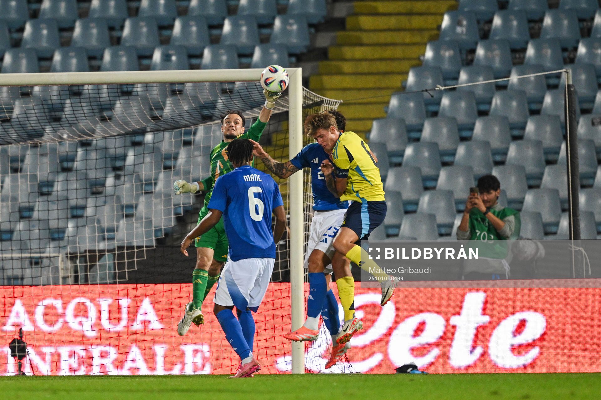 Goalkeeper Elis Bishesari of Sweden and Filippo Mane of