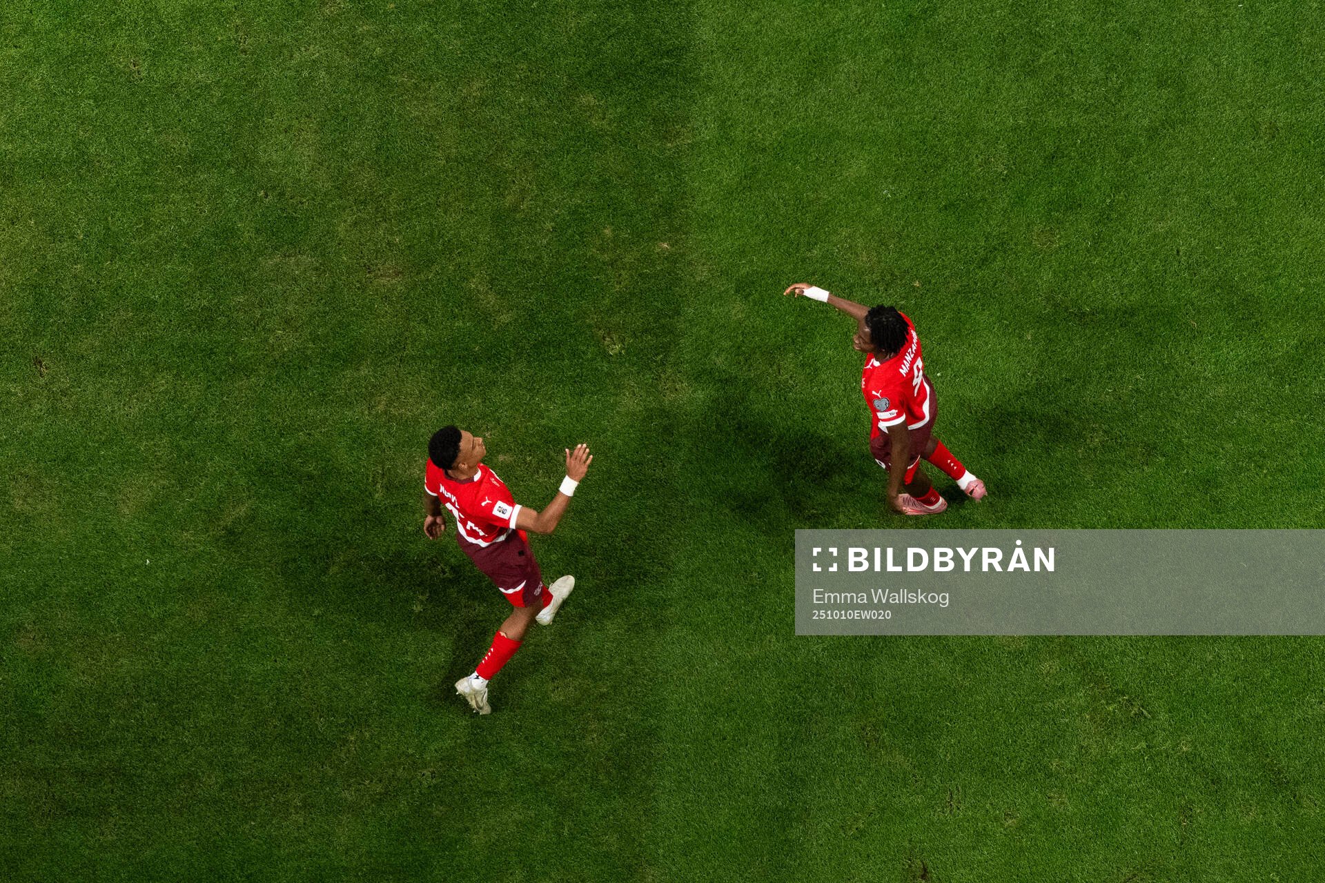 Johan Manzambi of Switzerland celebrates with Dan Ndoye