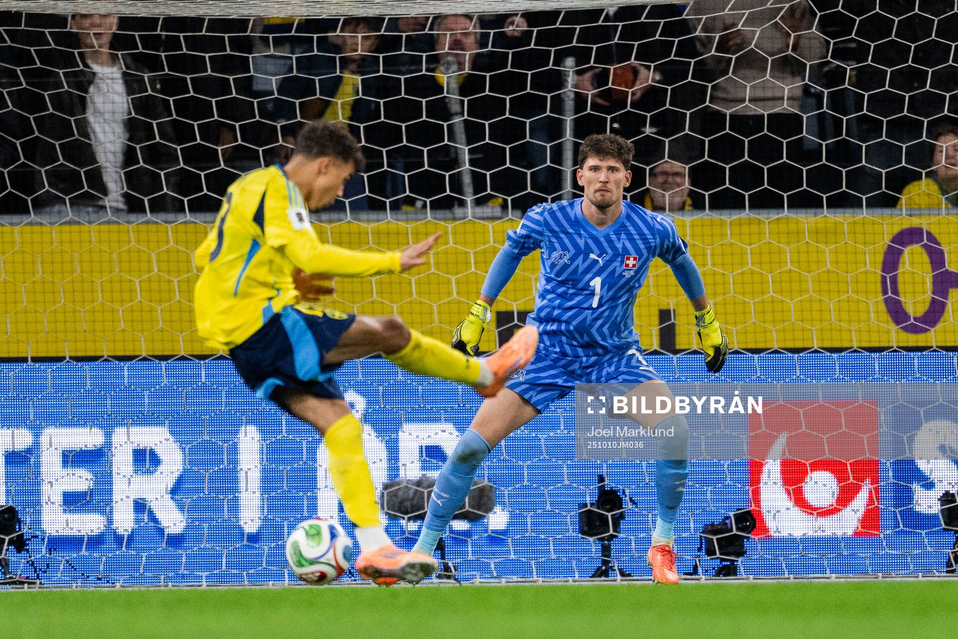 Goalkeeper Gregor Kobel of Switzerland and Yasin Ayari of
