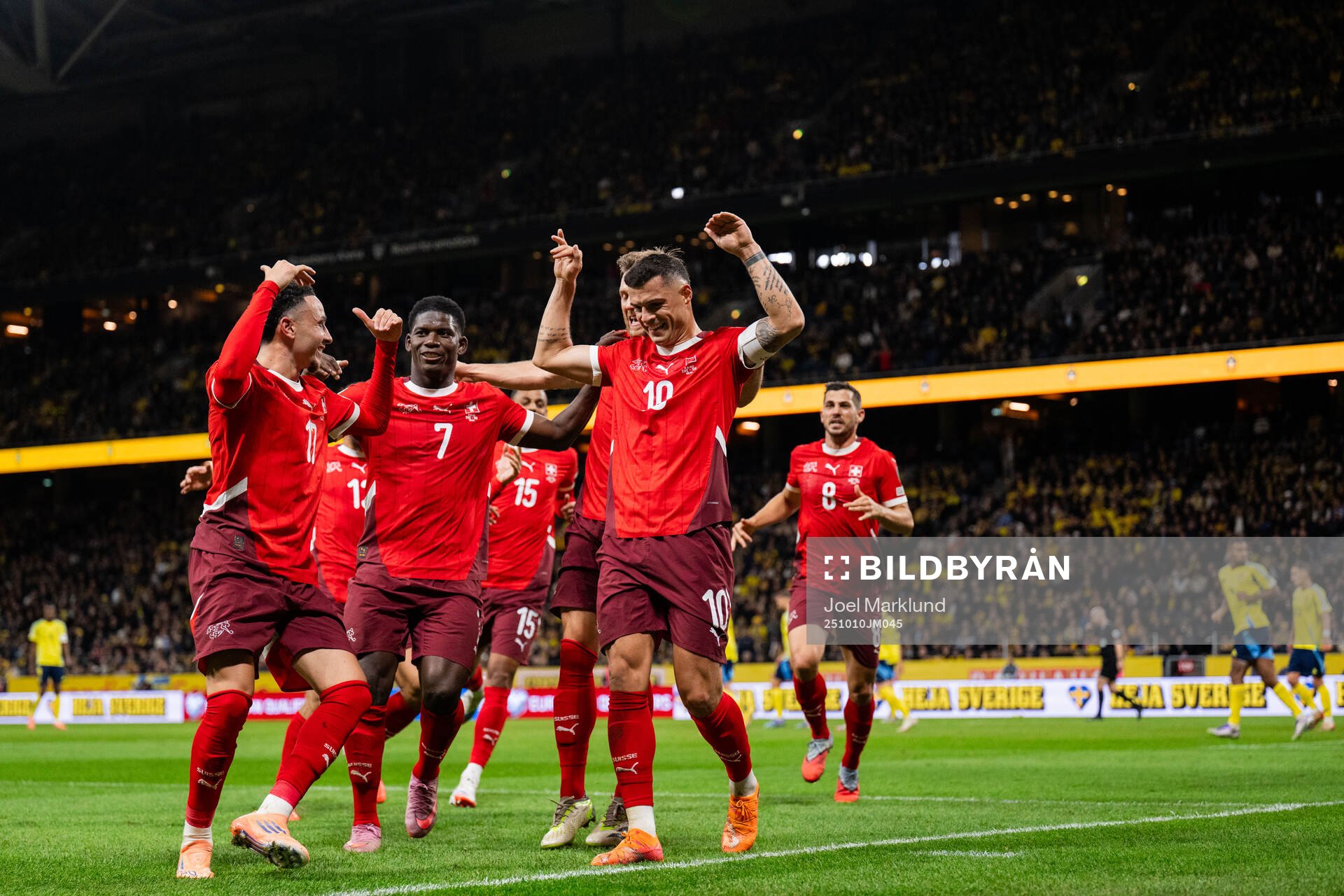 Ruben Vargas, Breel Embolo, and Granit Xhaka of Switzerland