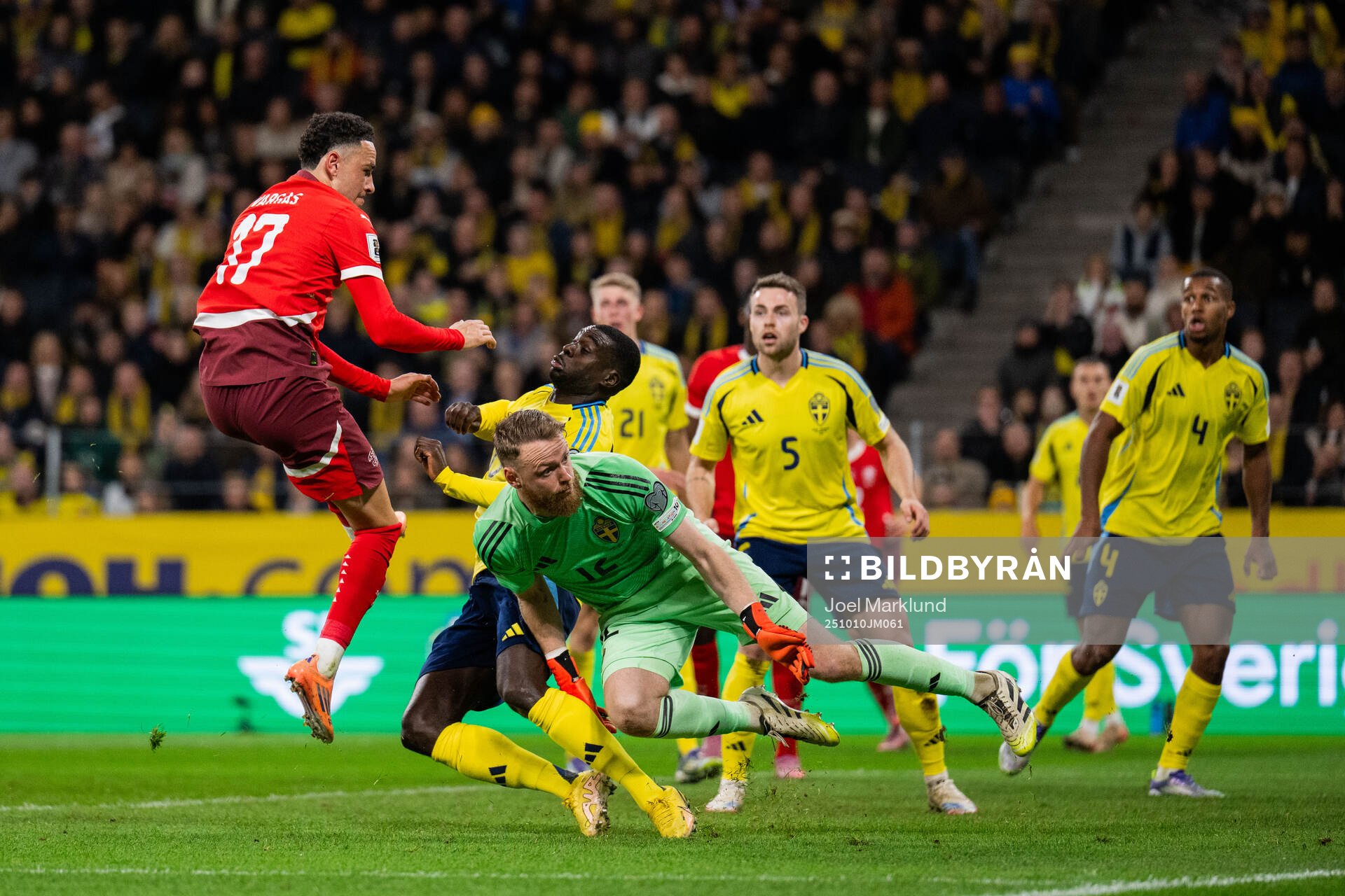 Ruben Vargas of Switzerland against Ken Sema and goalkeeper