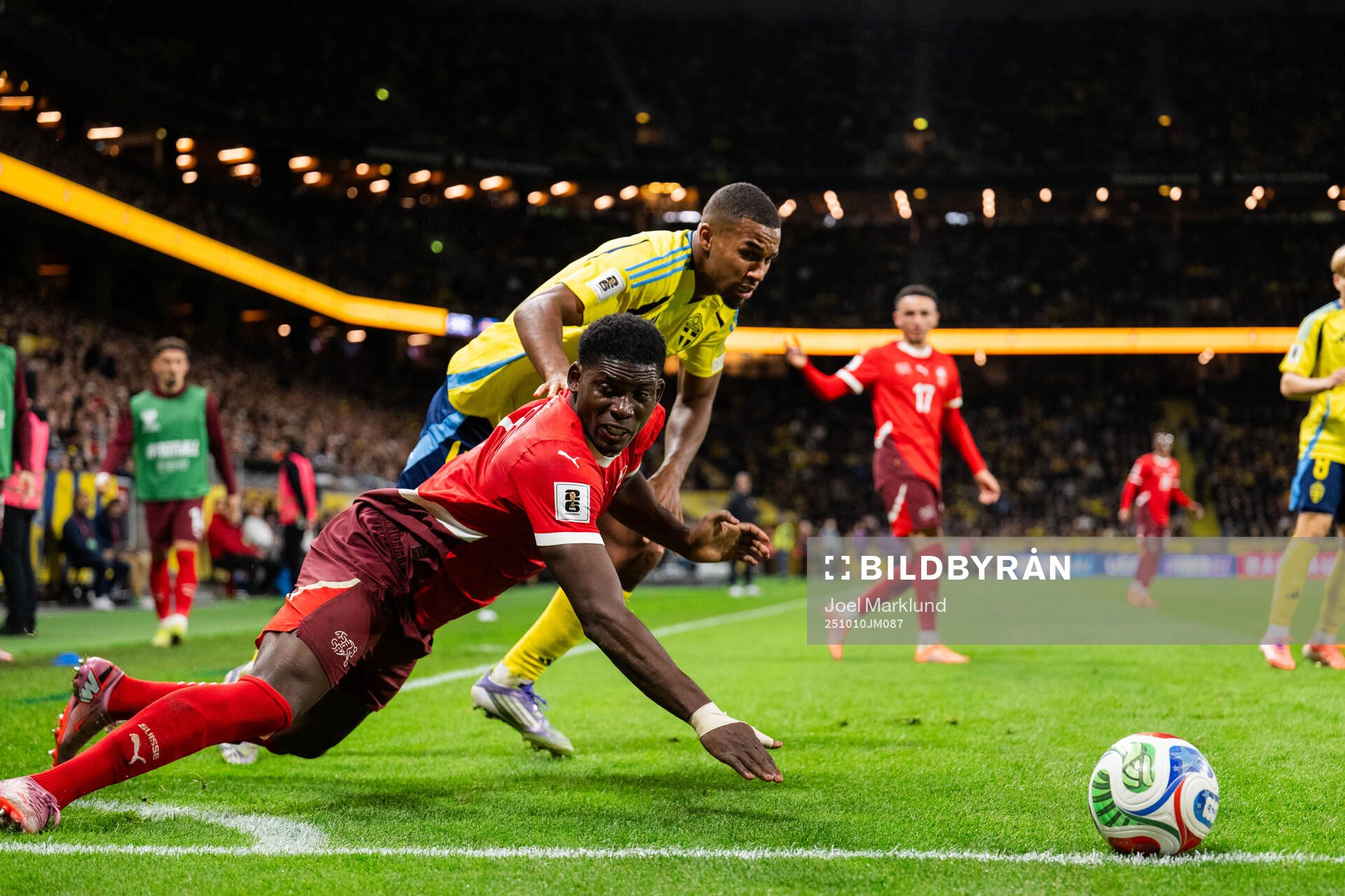 Breel Embolo of Switzerland and Isak Hien of Sweden
