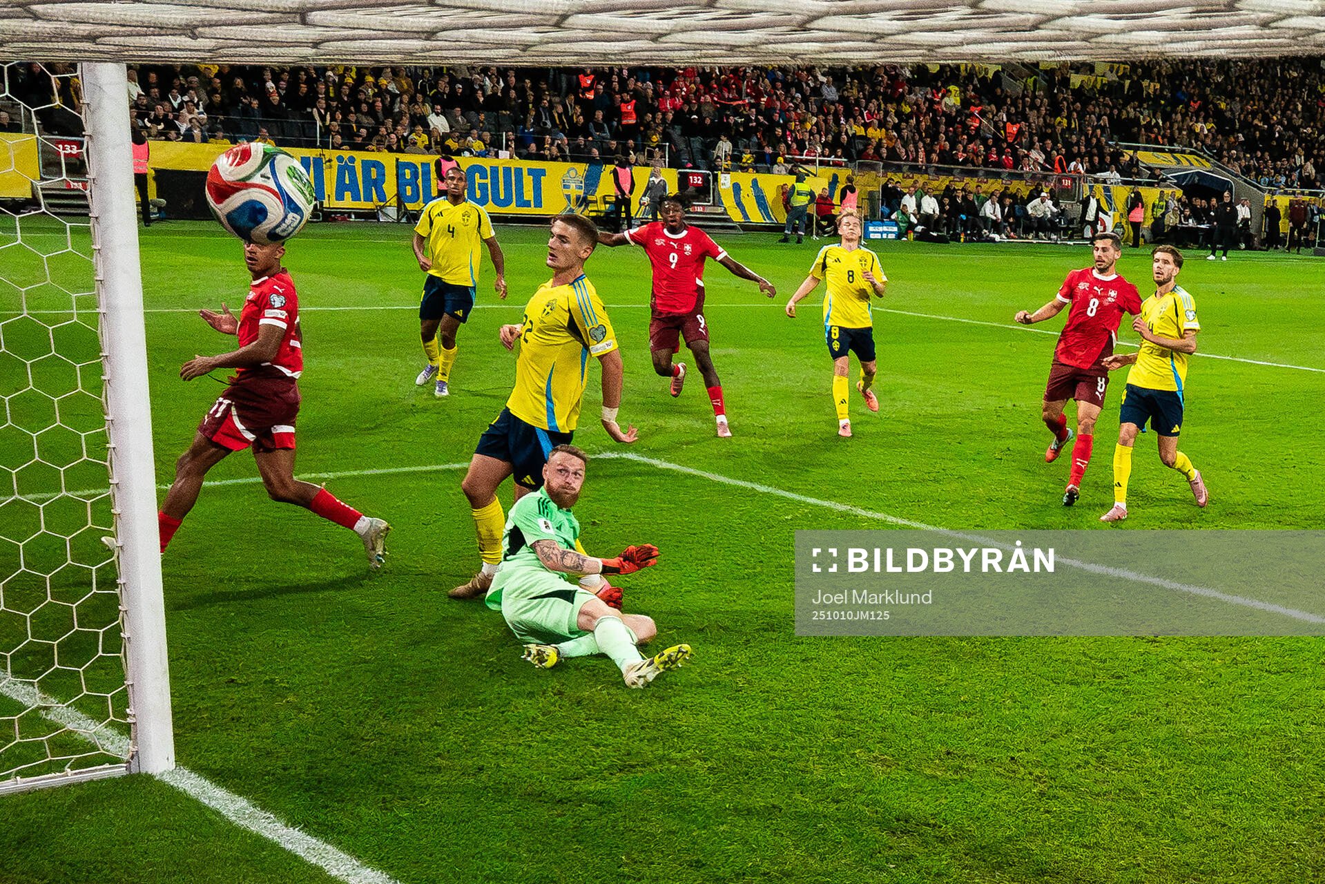 Johan Manzambi of Switzerland scores 0-2 behind goalkeeper