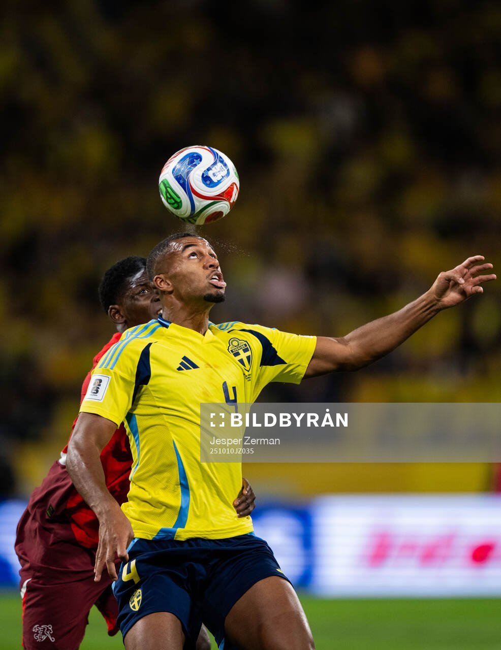 Breel Embolo of Switzerland and Isak Hien of Sweden