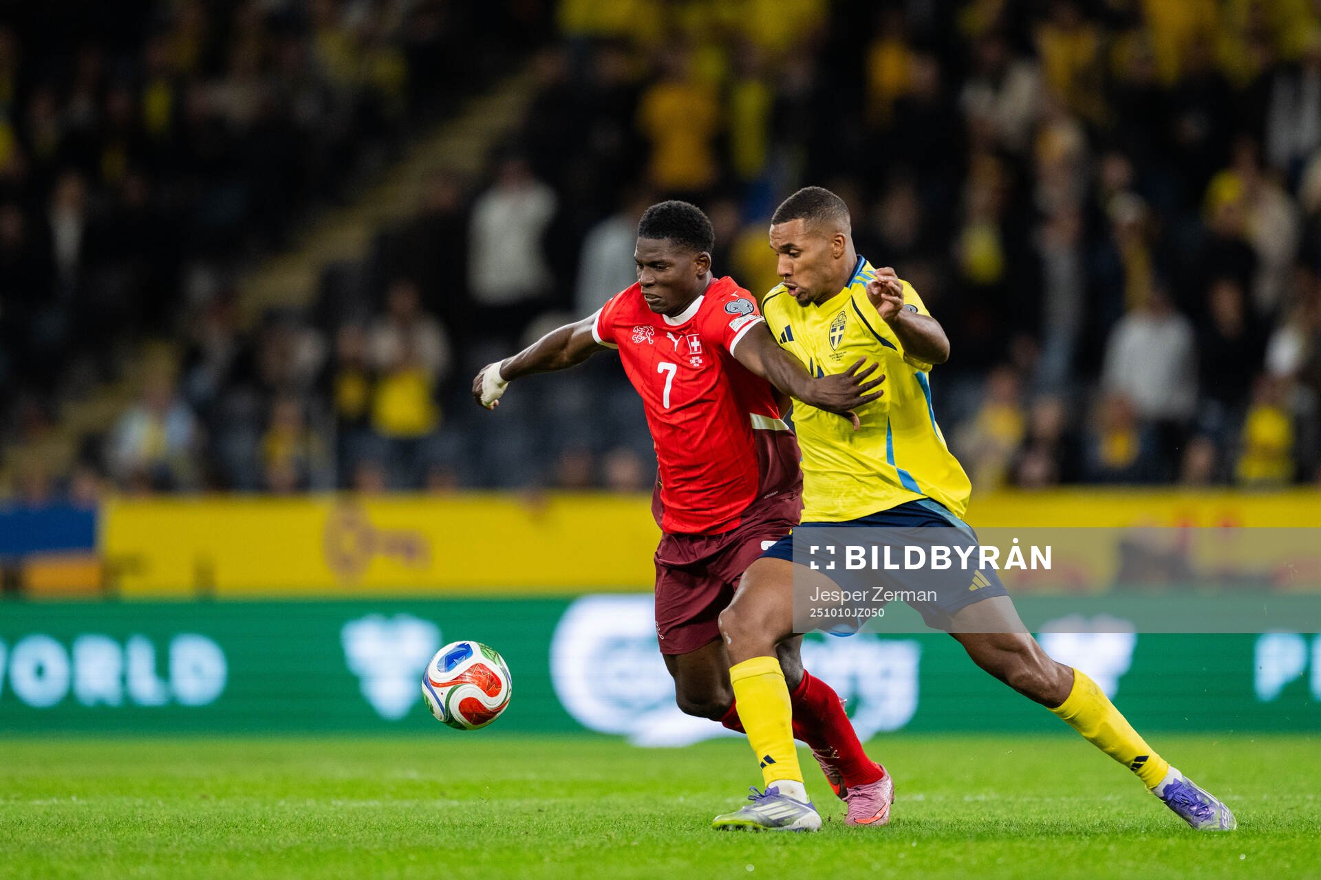 Breel Embolo of Switzerland and Isak Hien of Sweden