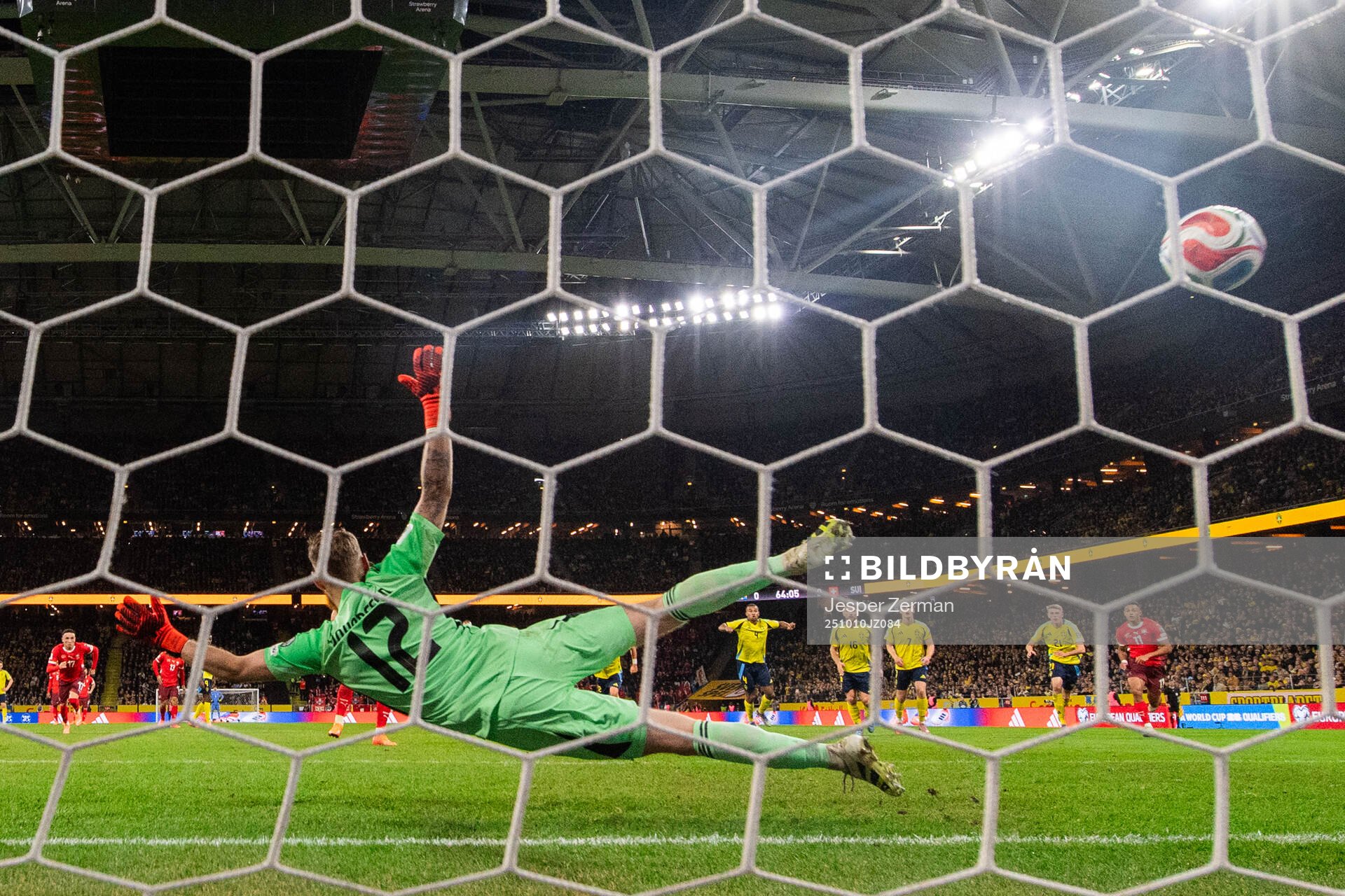 Goalkeeper Viktor Johansson of Sweden when Granit Xhaka of
