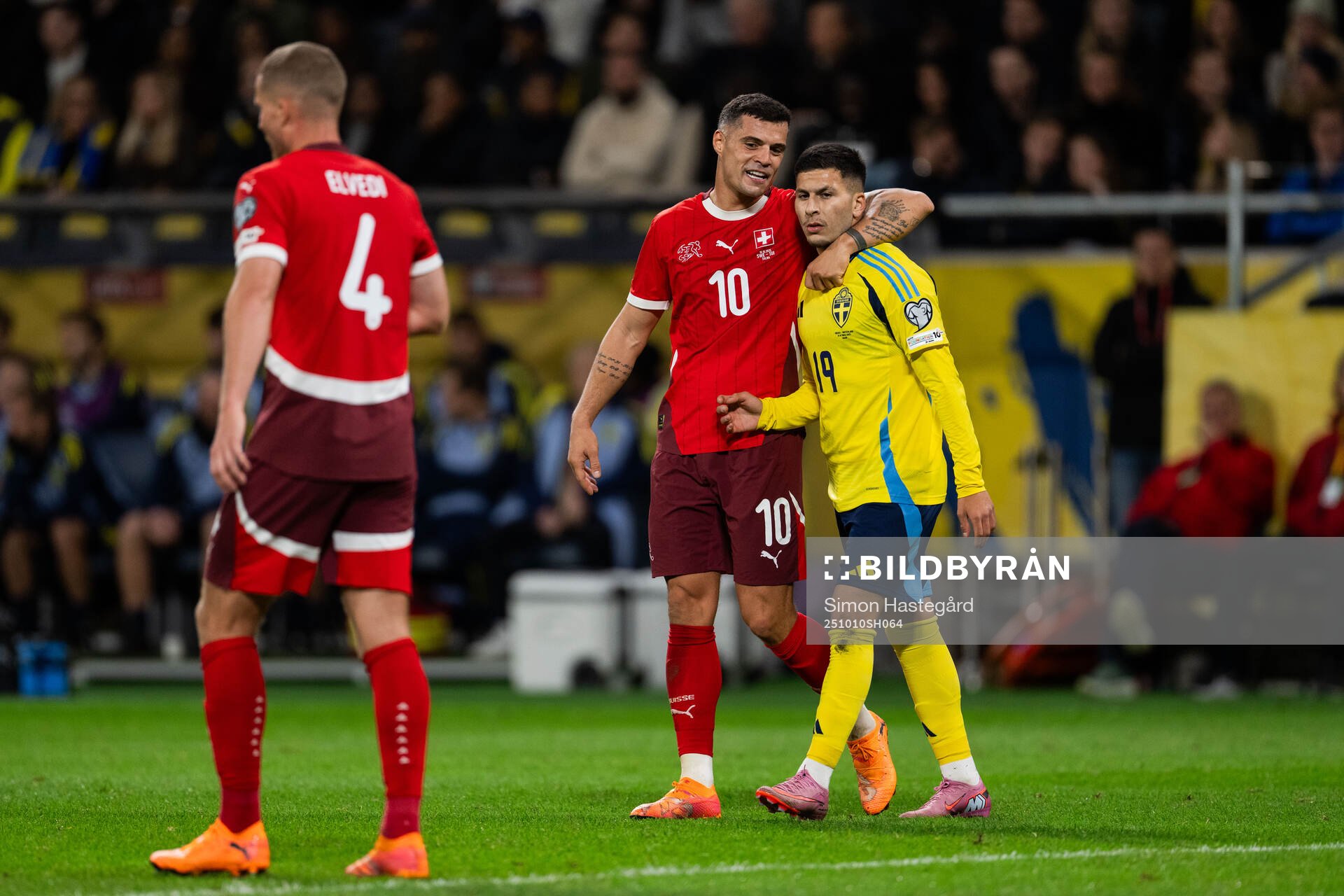 Granit Xhaka of Switzerland and Roony Bardghji of Sweden