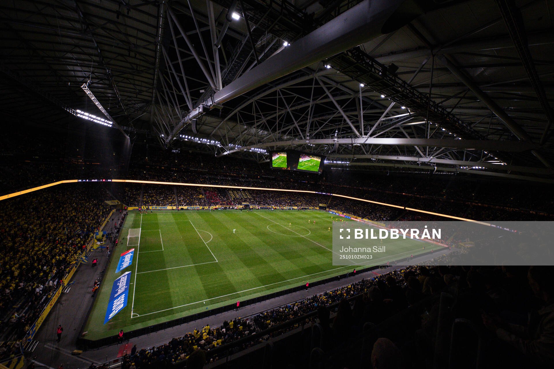 Spectators watch the FIFA World Cup Qualifier football